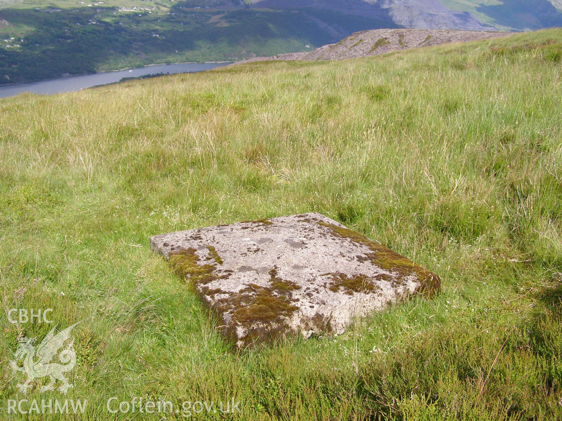 Digital colour photograph of Cefn Du Radio Station, concrete base V taken on 27/06/2007 by P.J. Schofield during the Snowdon North West Upland Survey undertaken by Oxford Archaeology North.