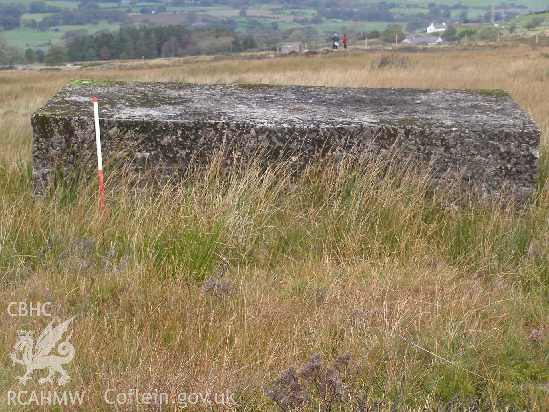 Digital colour photograph of Cefn Du Radio Station, concrete base XIX taken on 11/10/2007 by P.J. Schofield during the Snowdon North West Upland Survey undertaken by Oxford Archaeology North.
