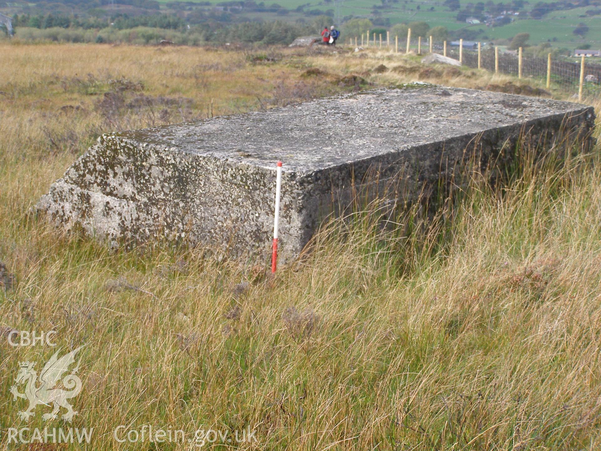 Digital colour photograph of Cefn Du Radio Station, concrete base XVIII taken on 11/10/2007 by P.J. Schofield during the Snowdon North West Upland Survey undertaken by Oxford Archaeology North.