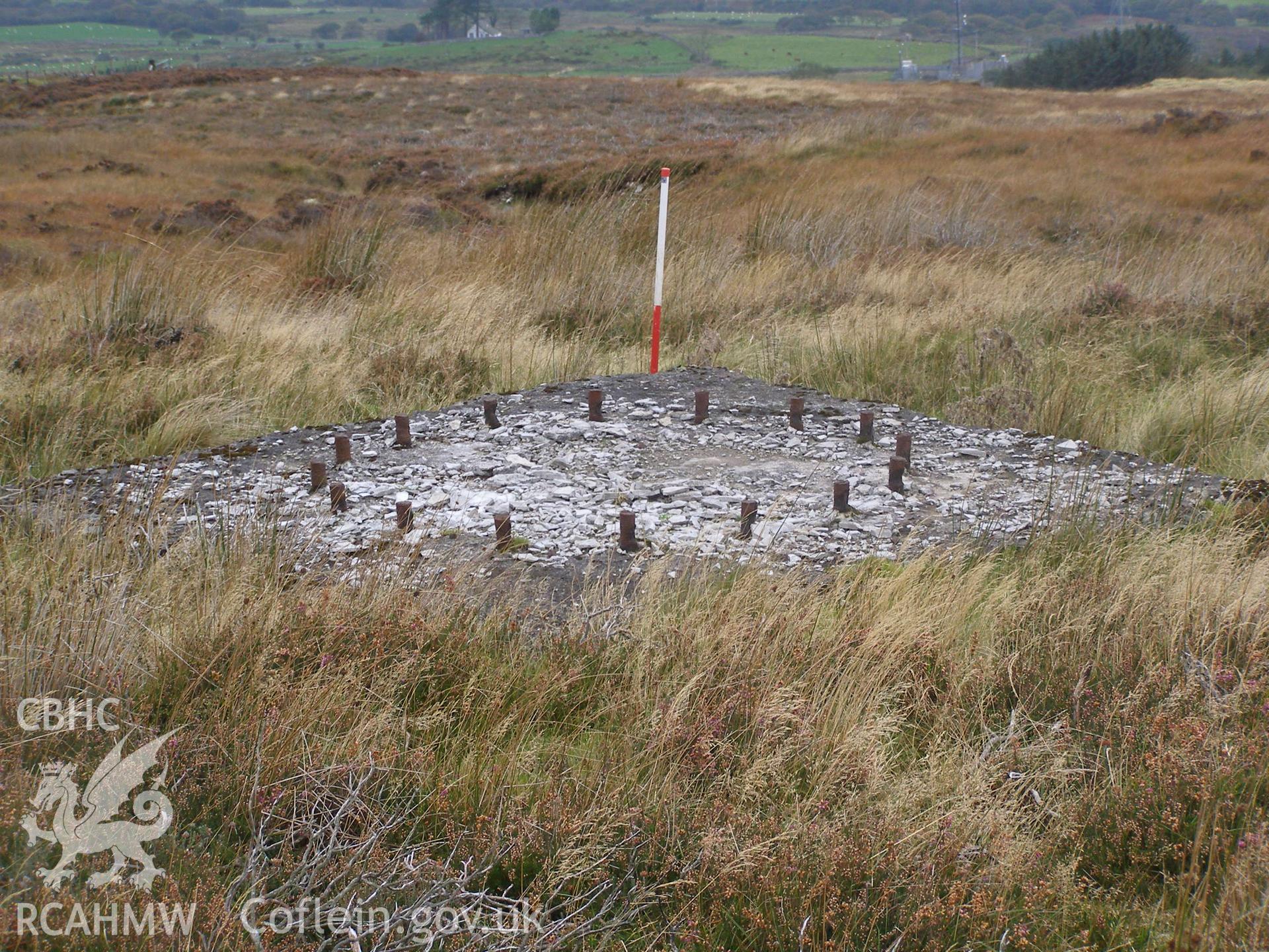 Digital colour photograph of Cefn Du Radio Station, concrete base XXV taken on 11/10/2007 by P.J. Schofield during the Snowdon North West Upland Survey undertaken by Oxford Archaeology North.