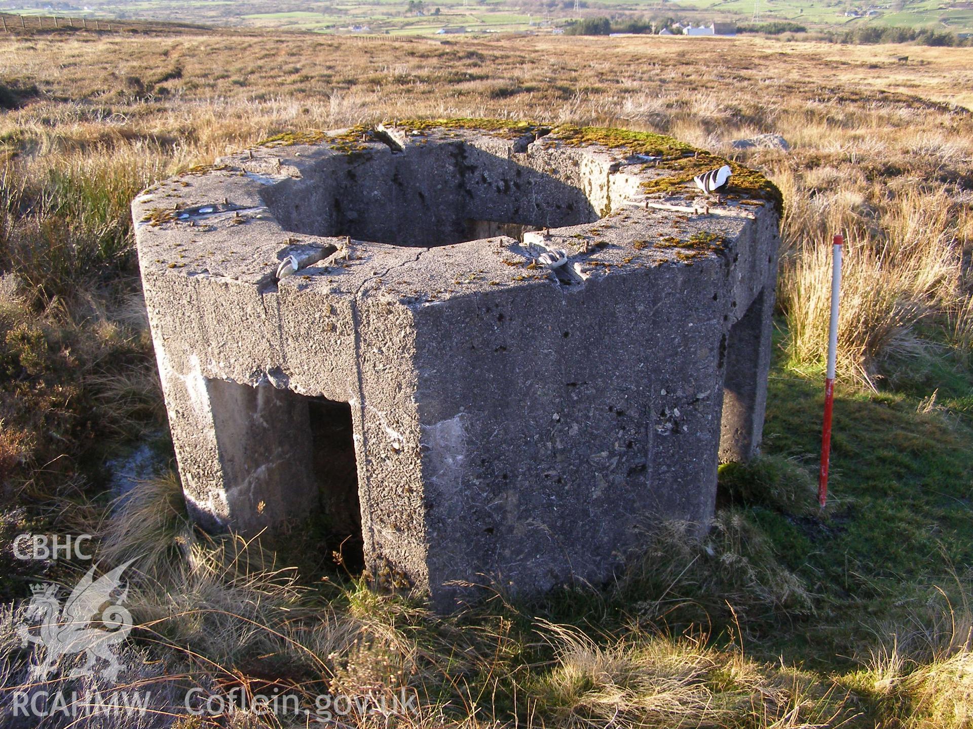 Digital colour photograph of Cefn Du Radio Station, concrete base XXXII taken on 12/10/2007 by P.J. Schofield during the Snowdon North West Upland Survey undertaken by Oxford Archaeology North.