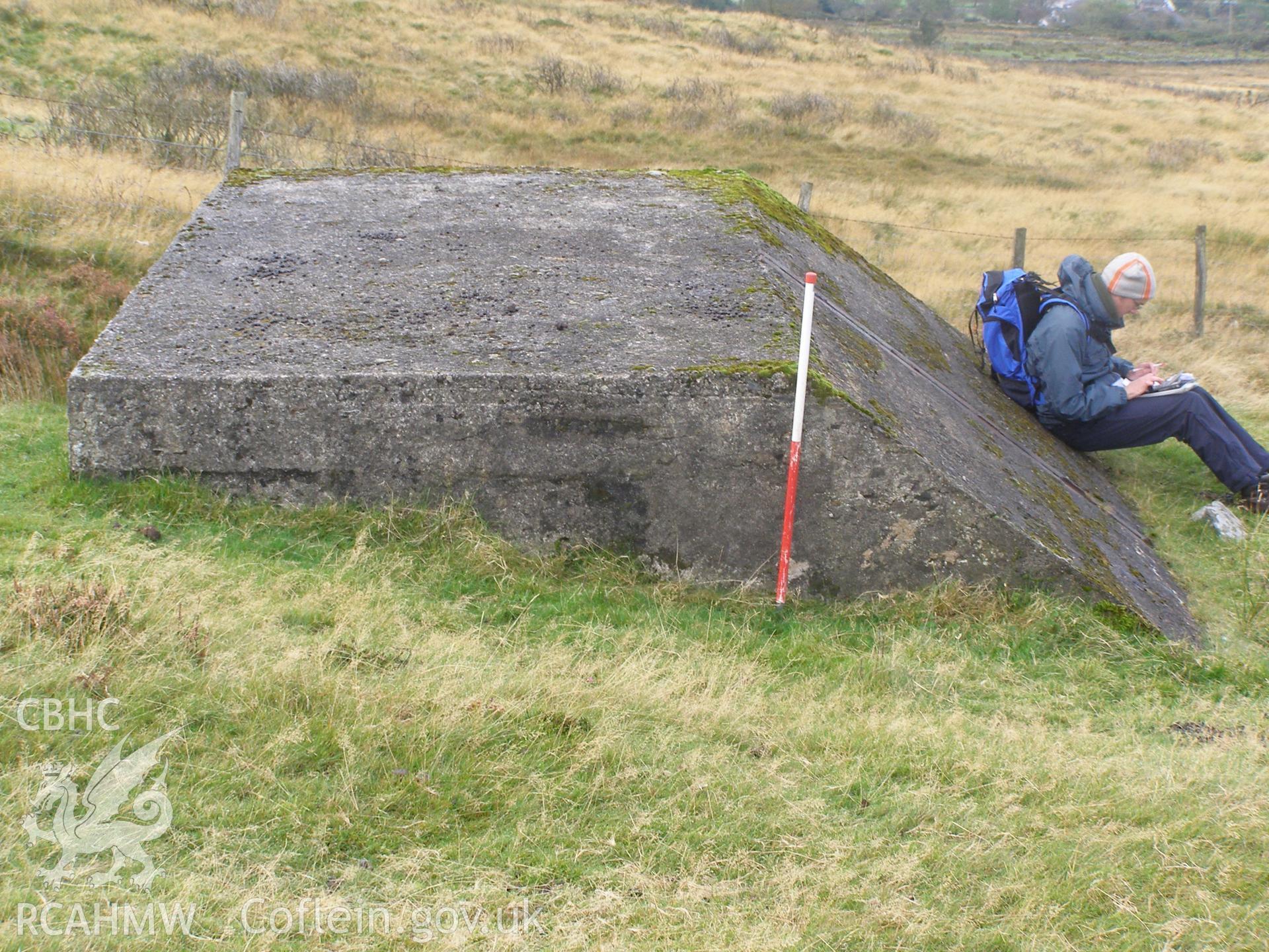 Digital colour photograph of Cefn Du Radio Station, concrete base XIII taken on 11/10/2007 by P.J. Schofield during the Snowdon North West Upland Survey undertaken by Oxford Archaeology North.