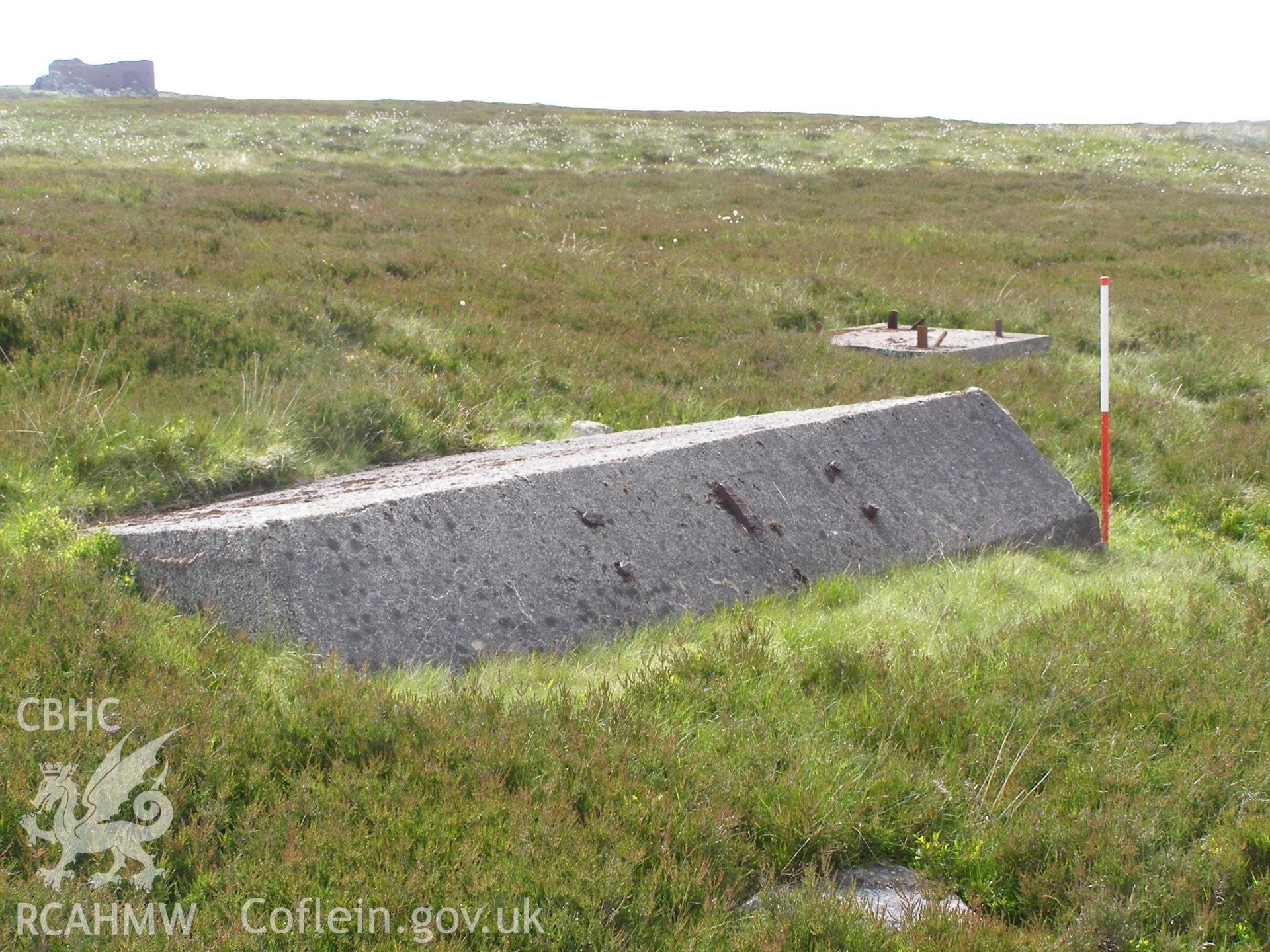 Digital colour photograph of Cefn Du Radio Station, concrete base I taken on 07/06/2007 by P.J. Schofield during the Snowdon North West Upland Survey undertaken by Oxford Archaeology North.