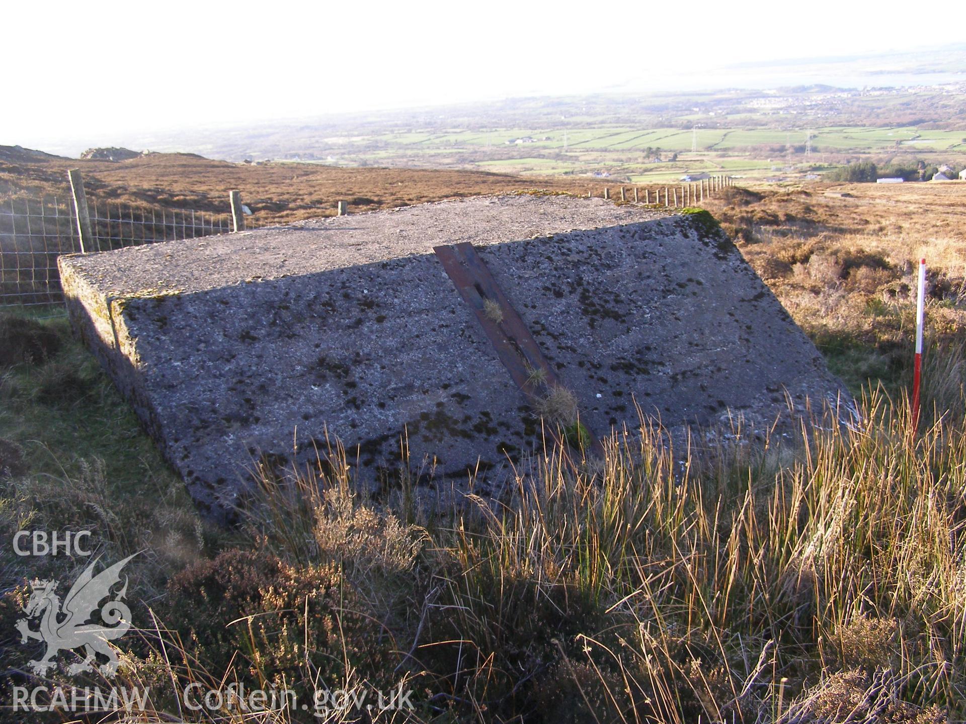 Digital colour photograph of Cefn Du Radio Station, concrete base XXXI taken on 12/10/2007 by P.J. Schofield during the Snowdon North West Upland Survey undertaken by Oxford Archaeology North.