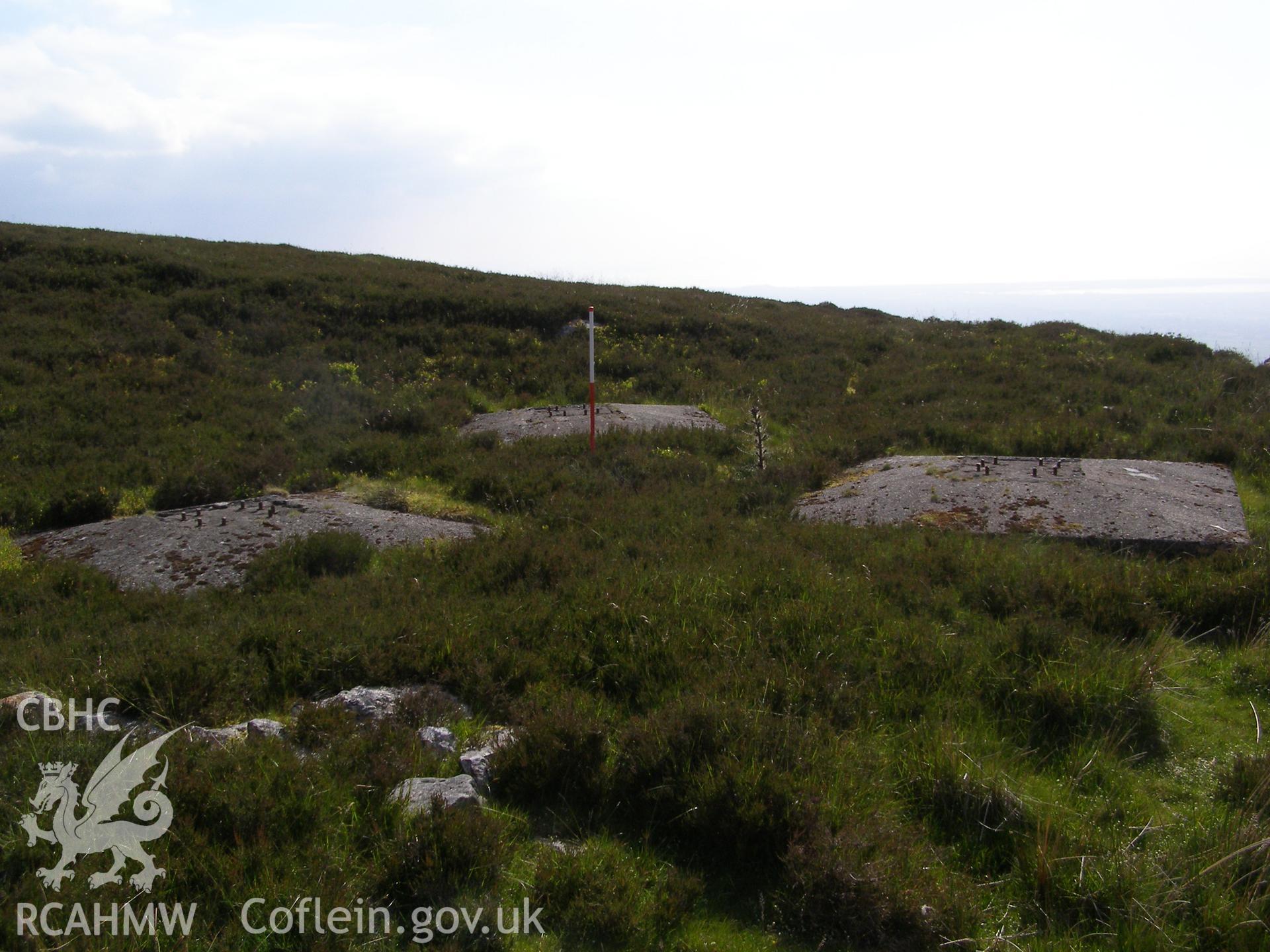 Digital colour photograph of Cefn Du Radio Station, concrete base IV taken on 07/06/2007 by P.J. Schofield during the Snowdon North West Upland Survey undertaken by Oxford Archaeology North.
