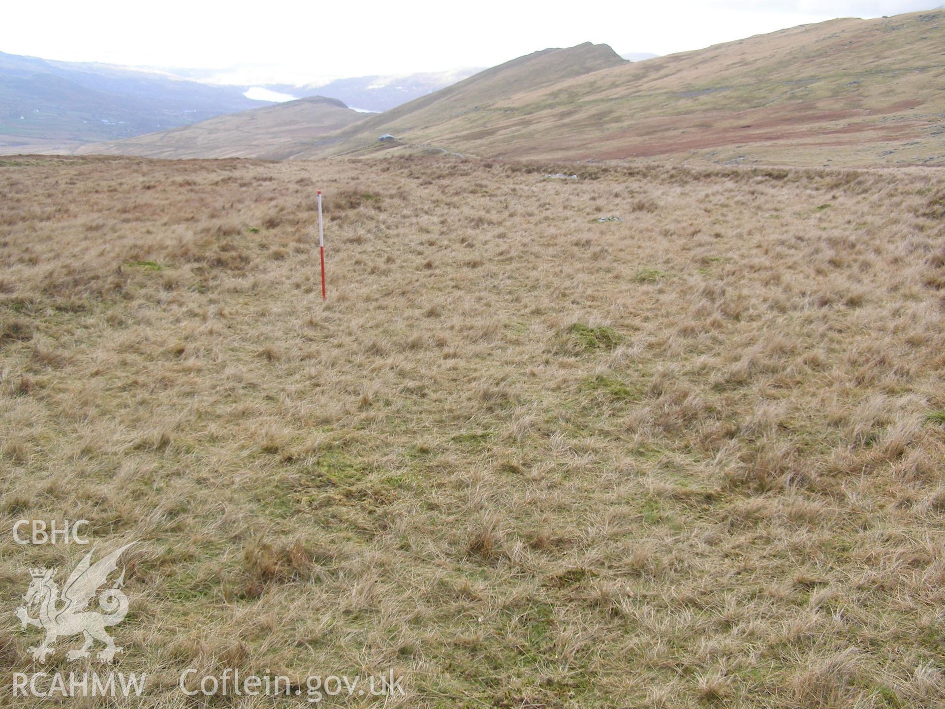 Digital colour photograph of Maen-Du'r Arddu peat cutting taken on 30/01/2008 by P.J. Schofield during the Snowdon North West Upland Survey undertaken by Oxford Archaeology North.