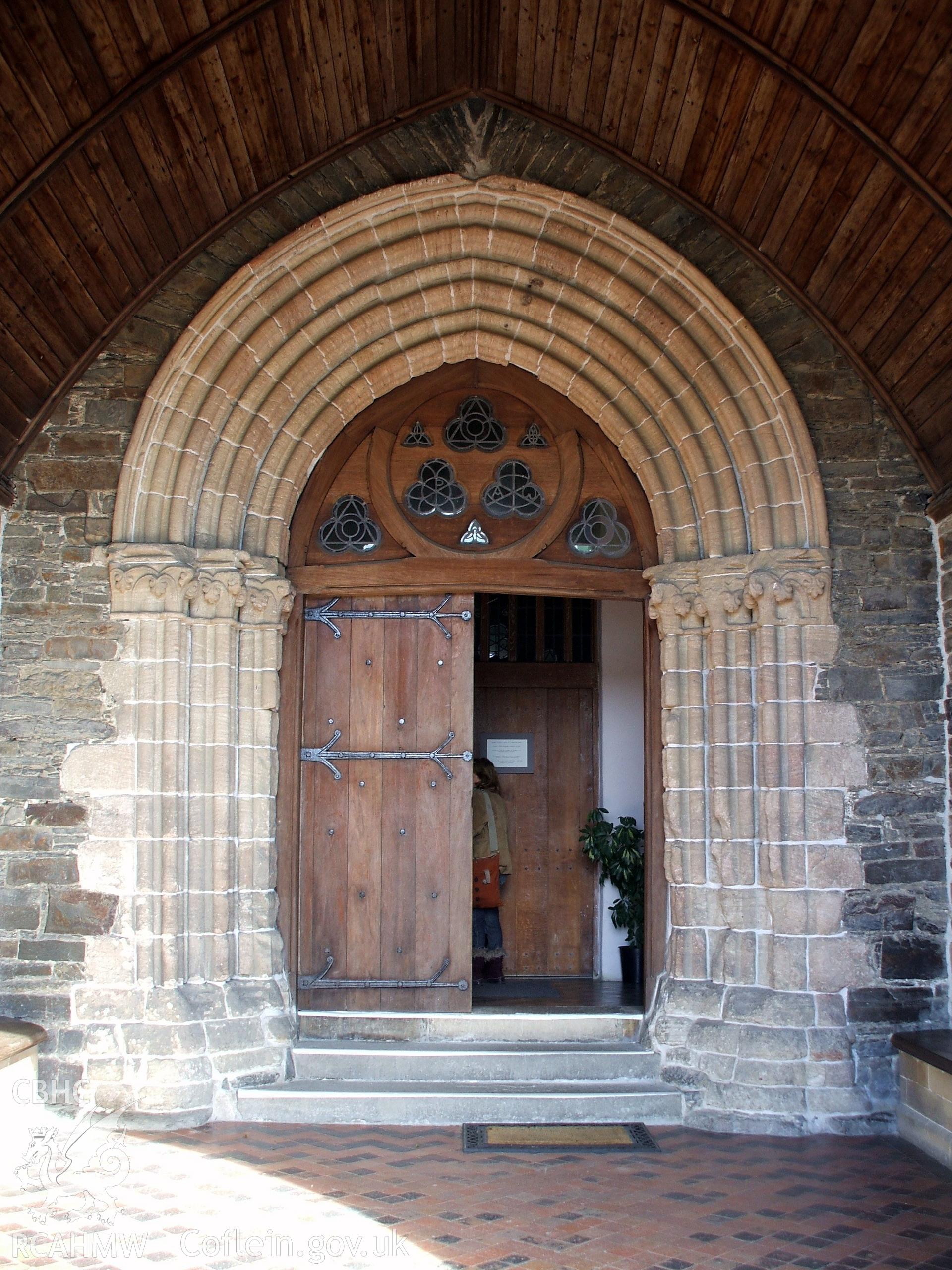 Colour digital photograph showing the front door of St. Padarn's Church, Llanbadarn Fawr.