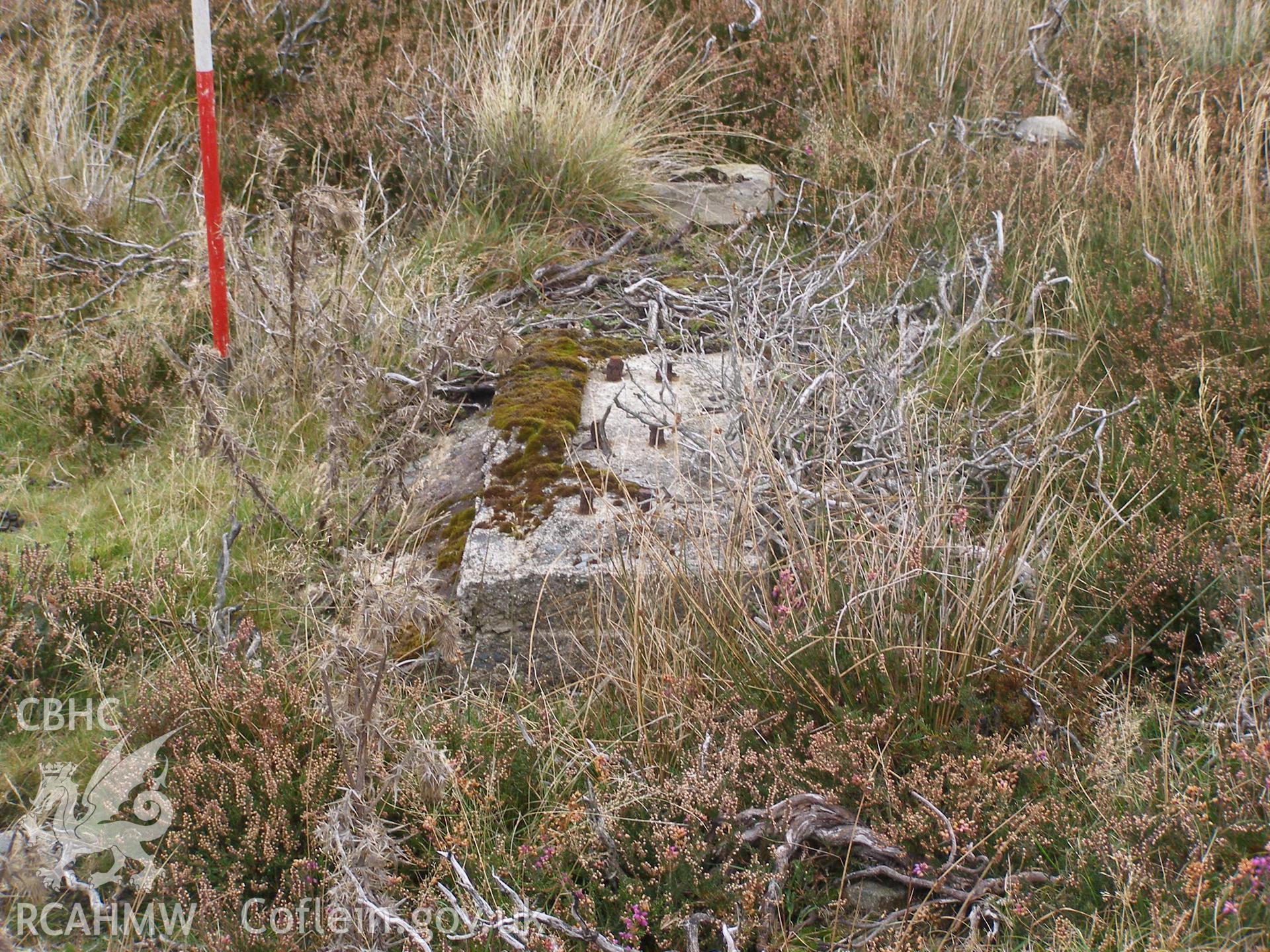 Digital colour photograph of Cefn Du Radio Station, concrete base XXVII taken on 11/10/2007 by P.J. Schofield during the Snowdon North West Upland Survey undertaken by Oxford Archaeology North.