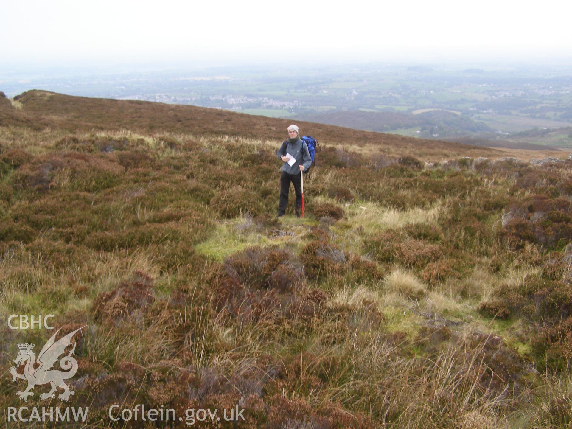 Digital colour photograph of Cefn Du Radio Station, concrete base X taken on 08/10/2007 by P.J. Schofield during the Snowdon North West Upland Survey undertaken by Oxford Archaeology North.