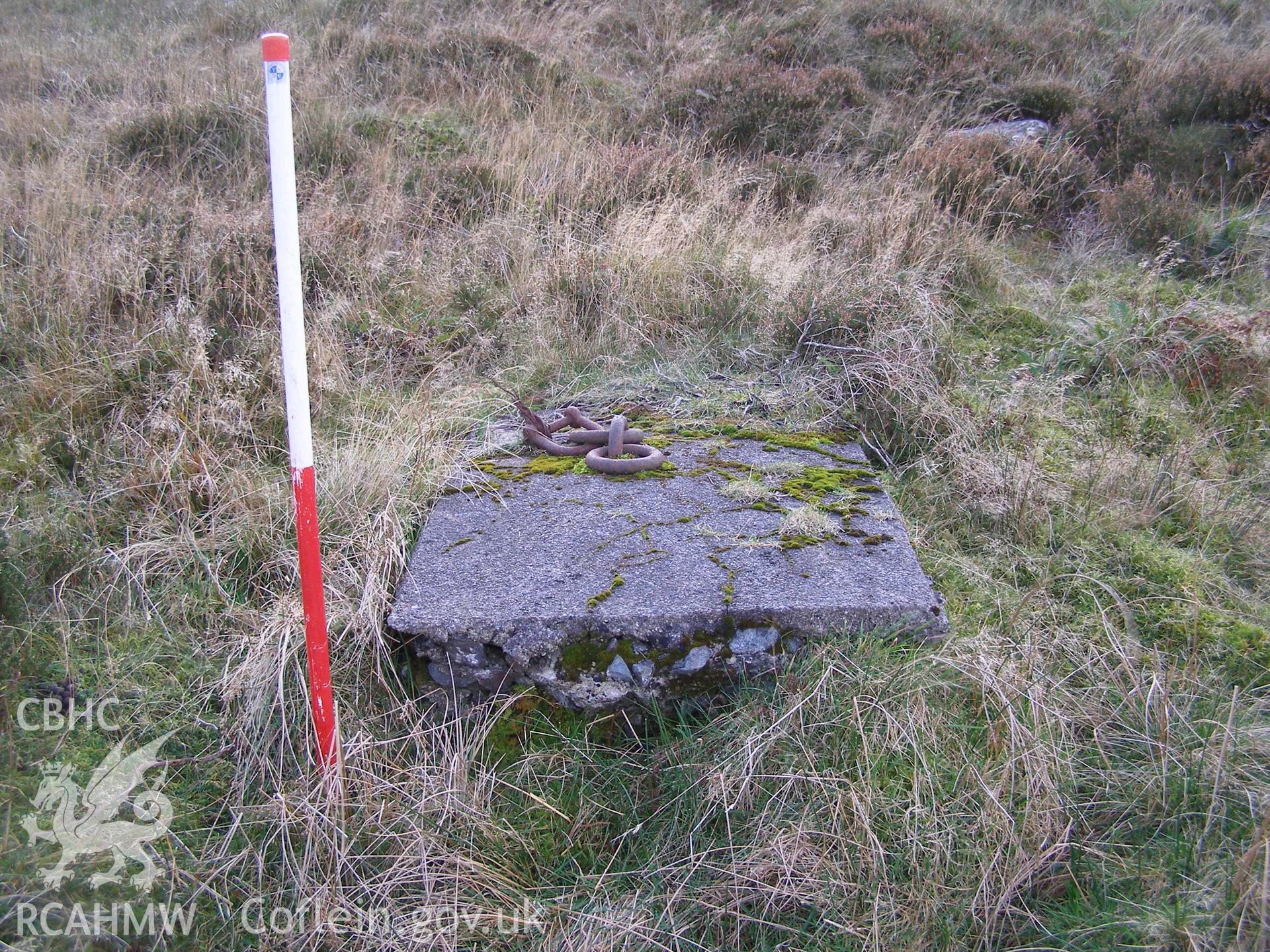Digital colour photograph of Cefn Du Radio Station, concrete base LXVIII taken on 13/12/2007 by P.J. Schofield during the Snowdon North West Upland Survey undertaken by Oxford Archaeology North.