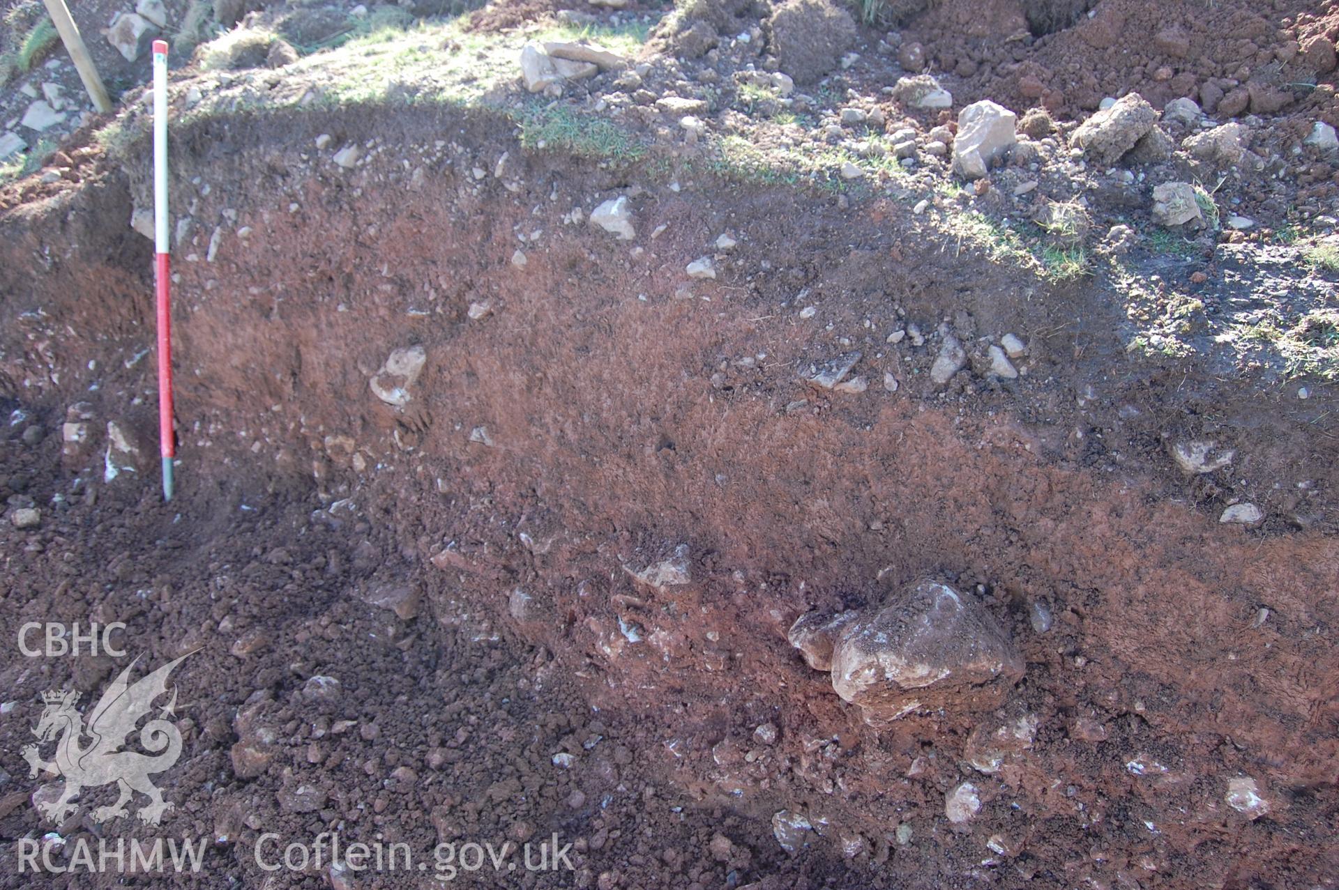 Digital photograph showing a section of mound 005 with 002 below.