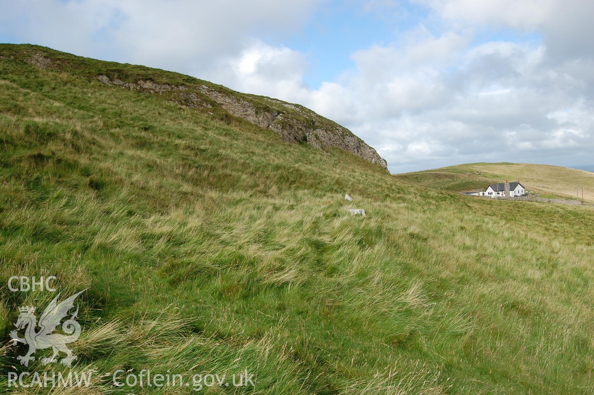 Digital photograph showing hut platform (PRN 4600) above ridge and furrow (PRN 797).