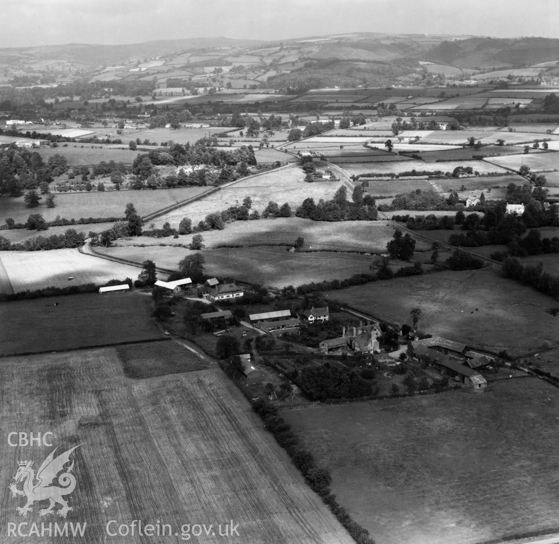 View of Rodd House, Presteigne in surrounding landscape. Oblique aerial photograph, 5?" cut roll film.