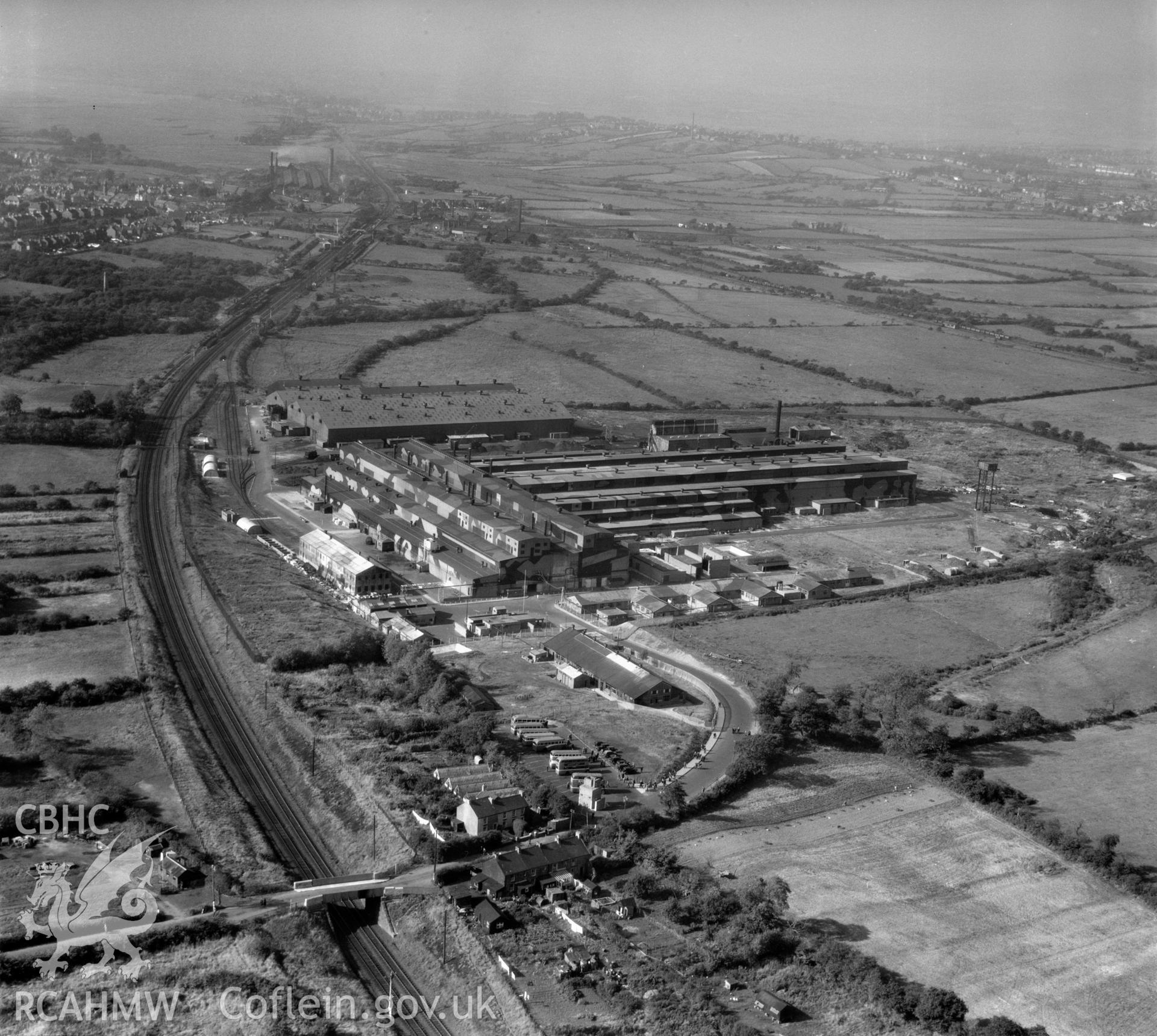 View of Gowerton aluminium factory (with wartime camouflage) showing workers leaving