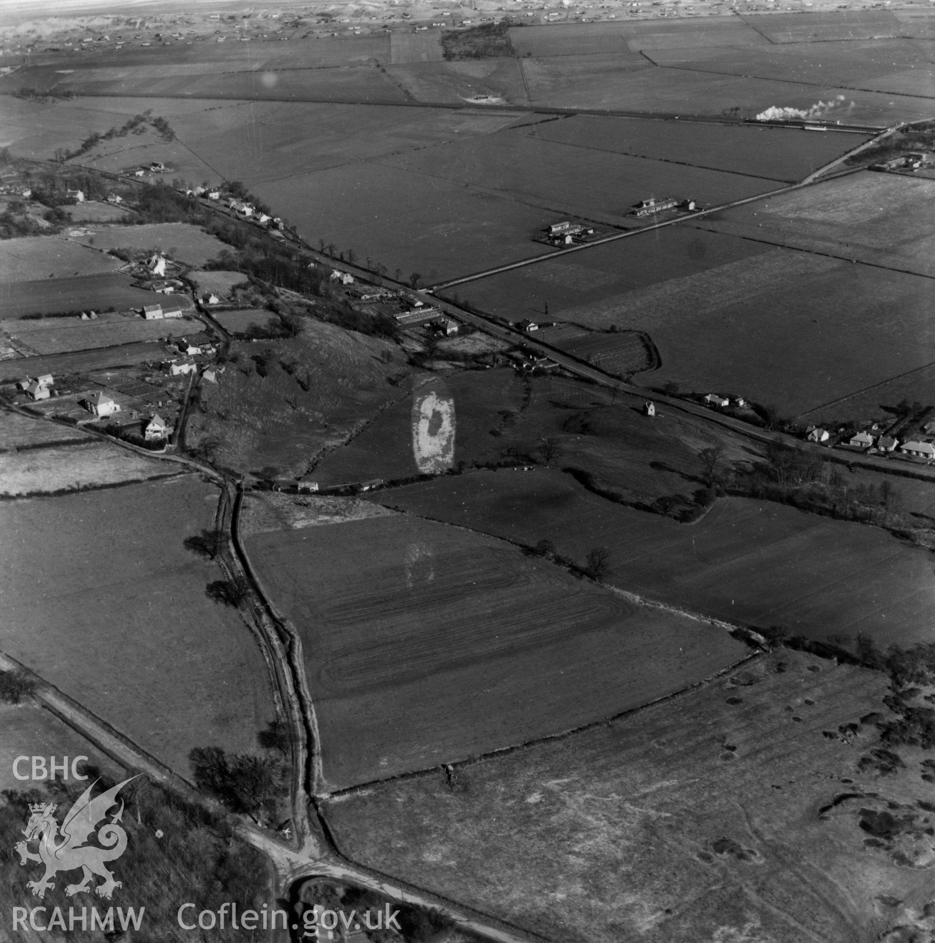 View of Gwespyr and the Chester & Holyhead railway. Oblique aerial photograph, 5?" cut roll film.