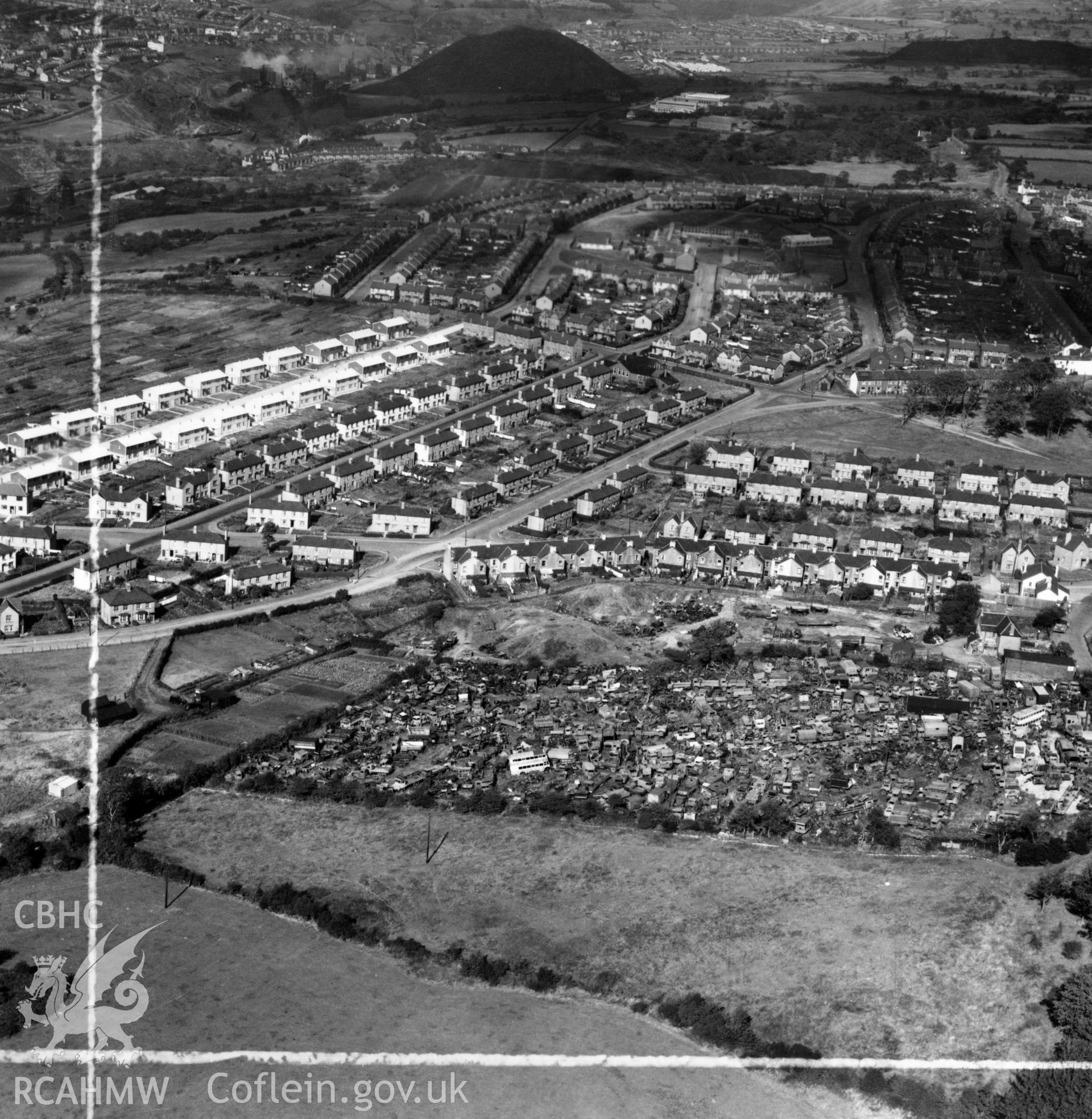View of Gibbs Brothers vehicle scrap yard at Blackwood, Mynyddislwyn. Oblique aerial photograph, 5?" cut roll film.