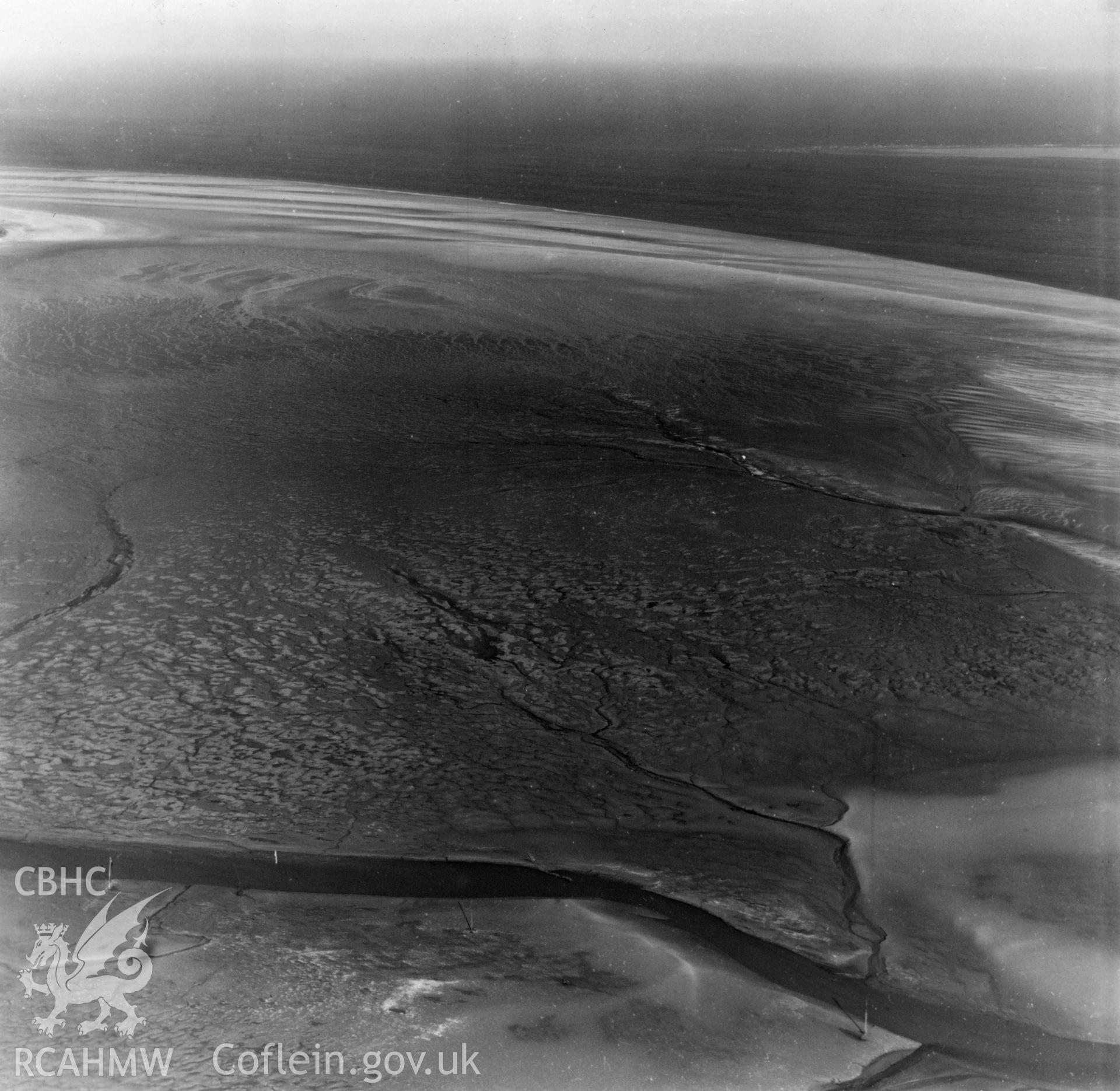 View of mudflats at Point of Ayr. Oblique aerial photograph, 5?" cut roll film.