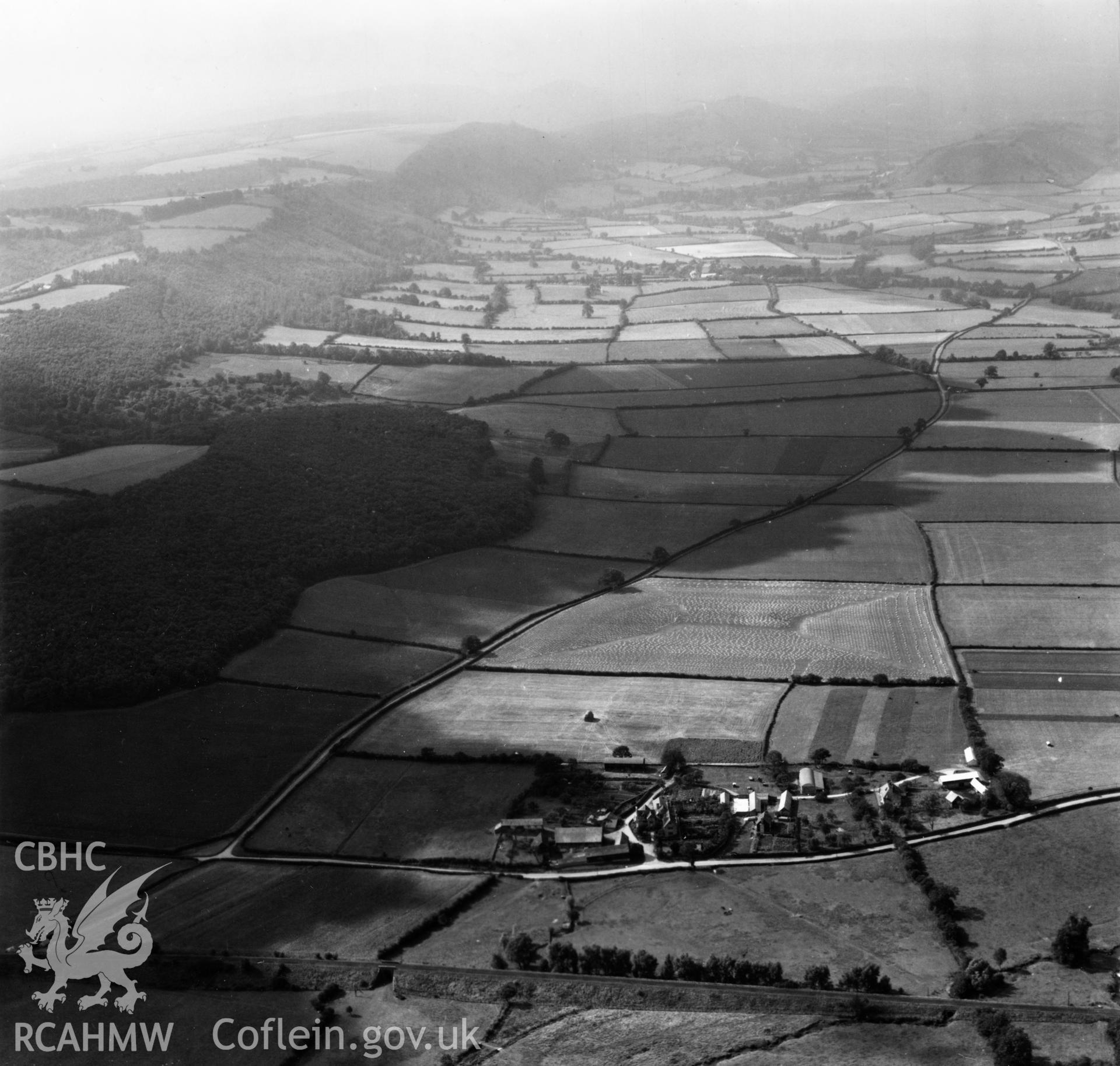 View of Rodd House, Presteigne in surrounding landscape. Oblique aerial photograph, 5?" cut roll film.