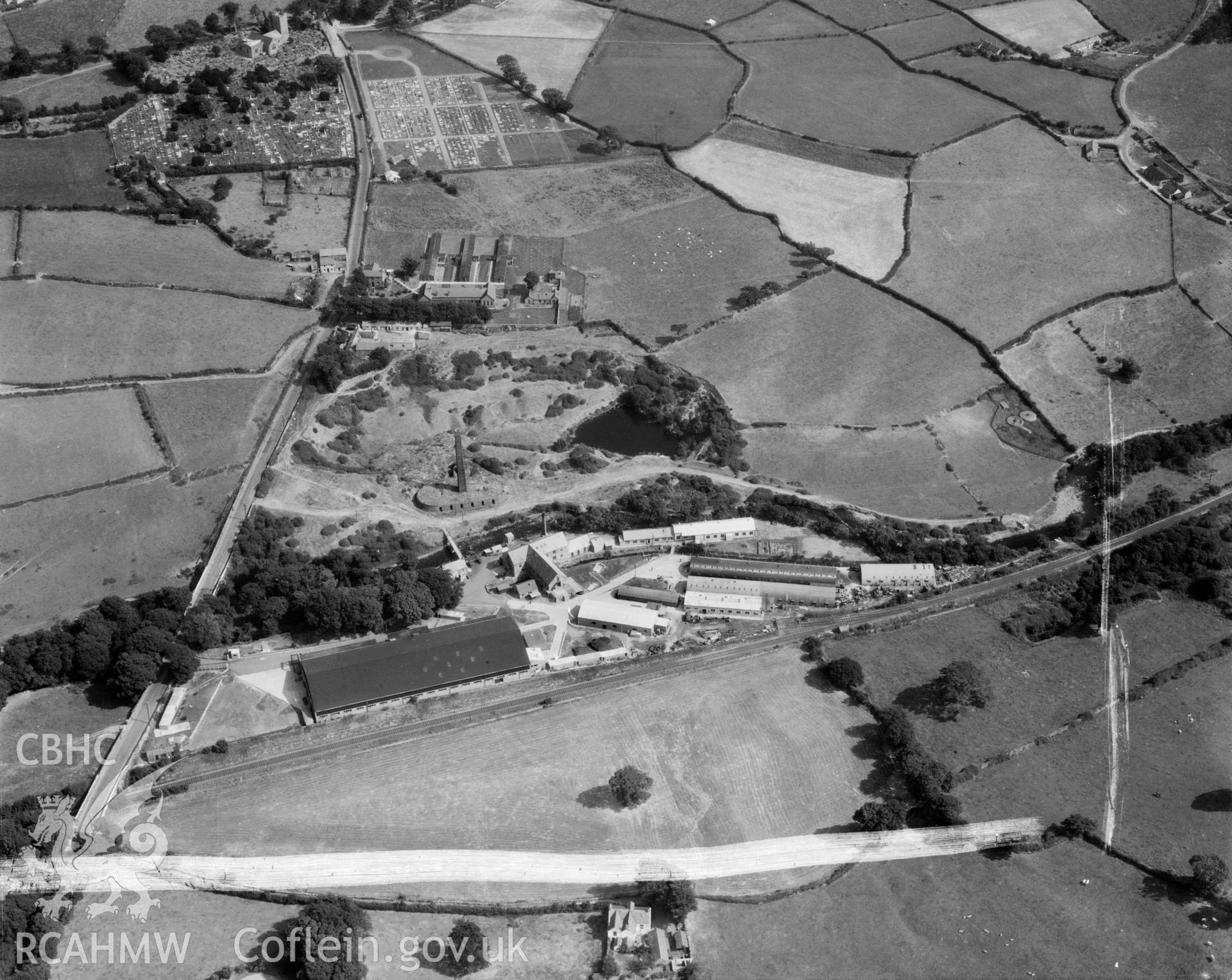 View of factory complex at Peblig Mill, Caernarfon, showing the mill, remains of brickworks, nissan huts and other works buildings