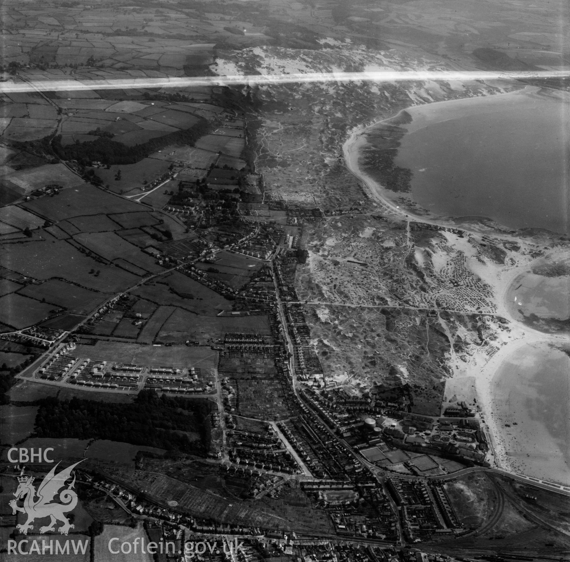 View of Newton housing at Porthcawl showing gas works, Griffin Park and Coney Beach Park. Oblique aerial photograph, 5?" cut roll film.