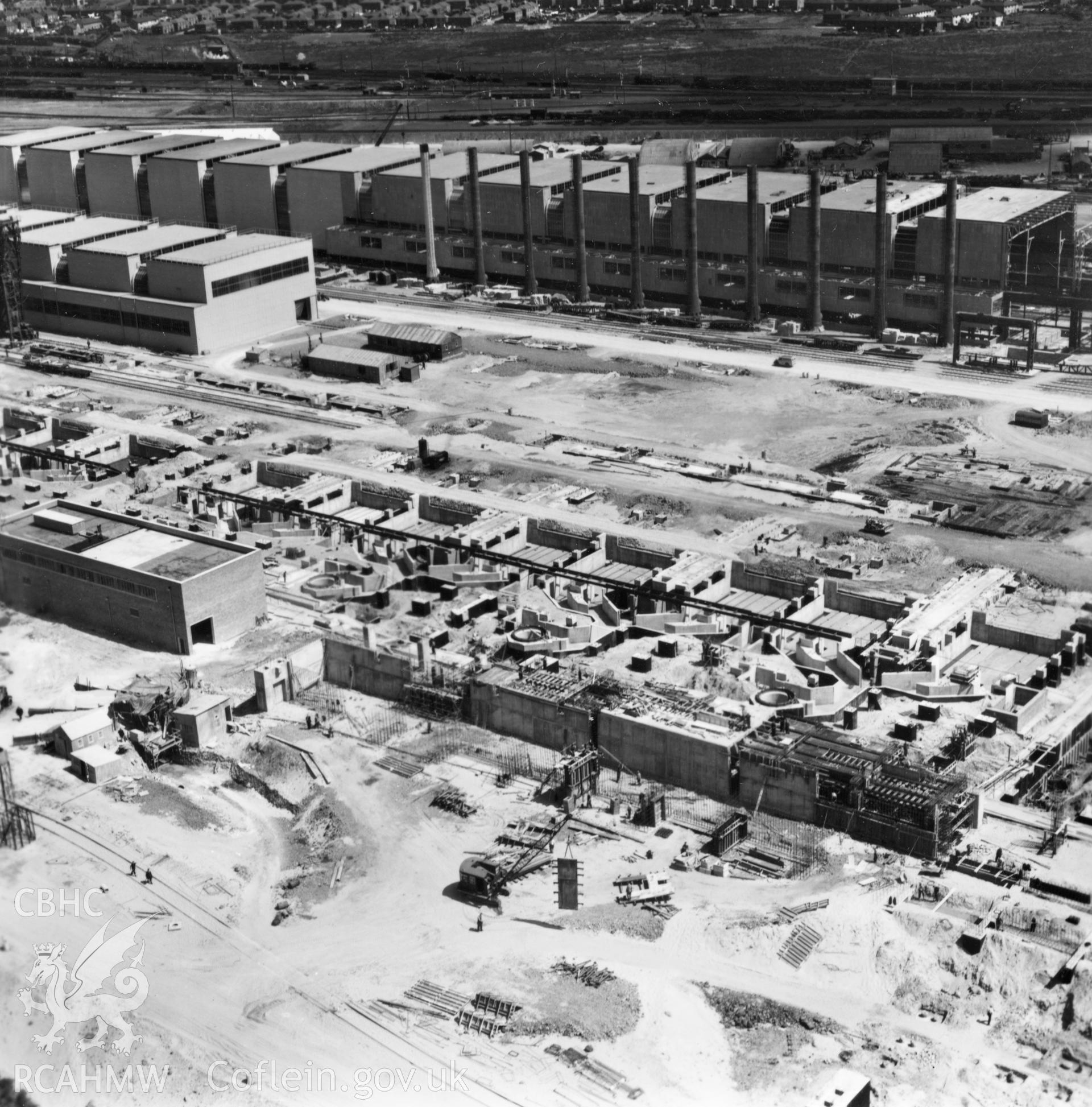 View of Abbey Steelworks, Port Talbot, under construction. Oblique aerial photograph, 5?" cut roll film.