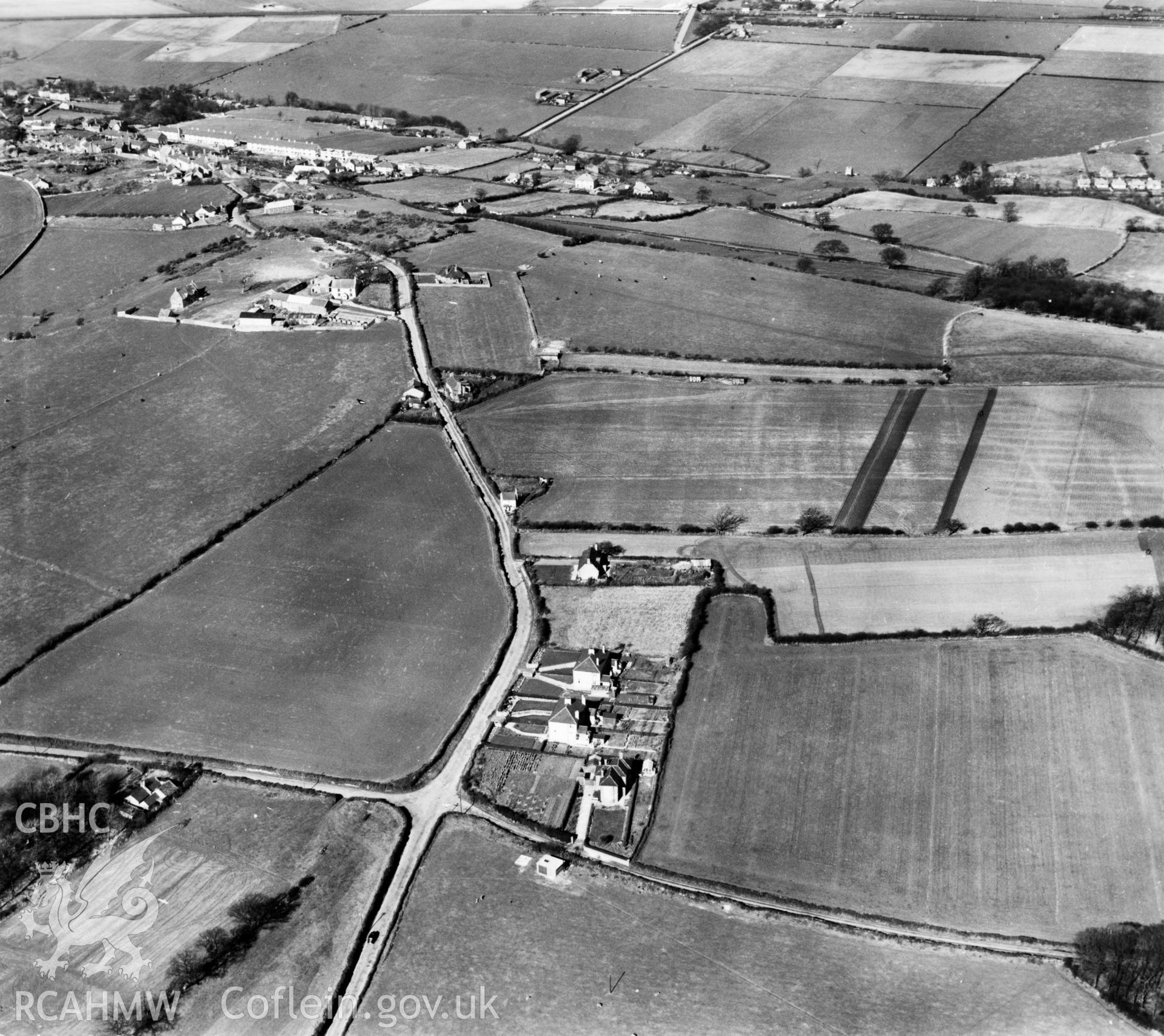 View of Gwespyr showing Bryn Llystyn and Four Ways crossroads. Oblique aerial photograph, 5?" cut roll film.