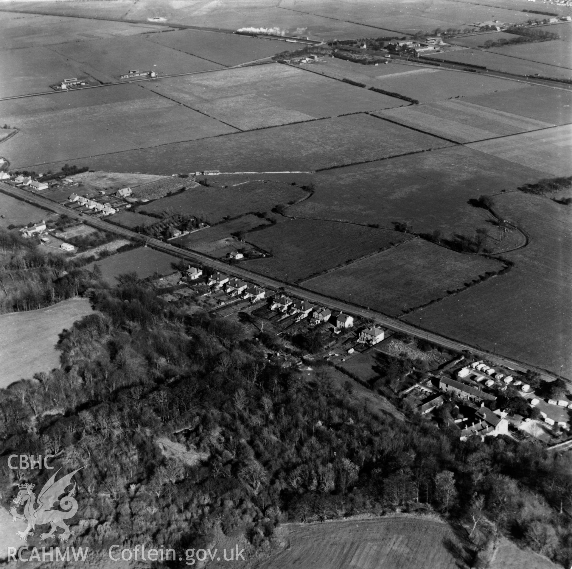 View of Tanlan and the Chester & Holyhead railway. Oblique aerial photograph, 5?" cut roll film.