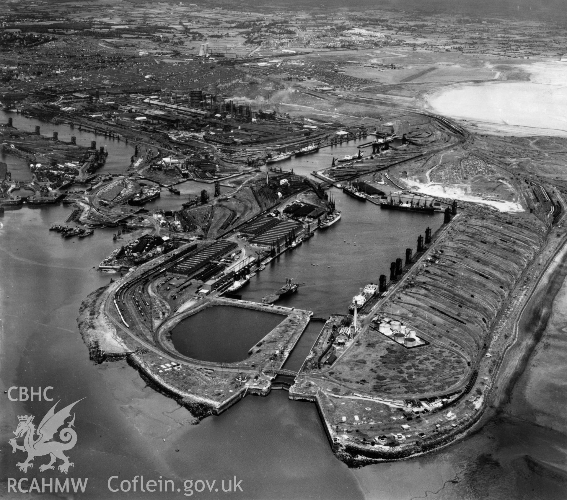 View of Cardiff docks from the south with Queen Alexandra dock in the foreground. Oblique aerial photograph, 5?" cut roll film.