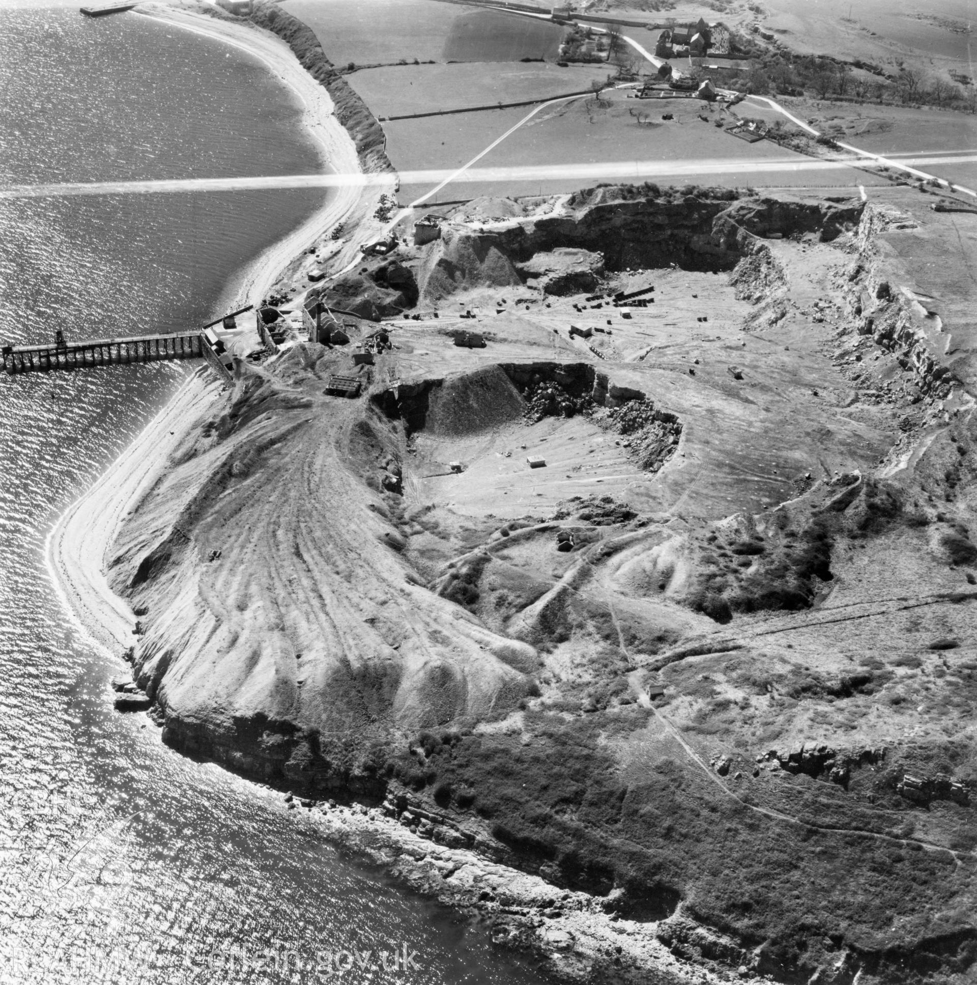 View of Flagstaff Quarry, Anglesey, commissioned by Cawood Wharton & Co. Ltd.. Oblique aerial photograph, 5?" cut roll film.