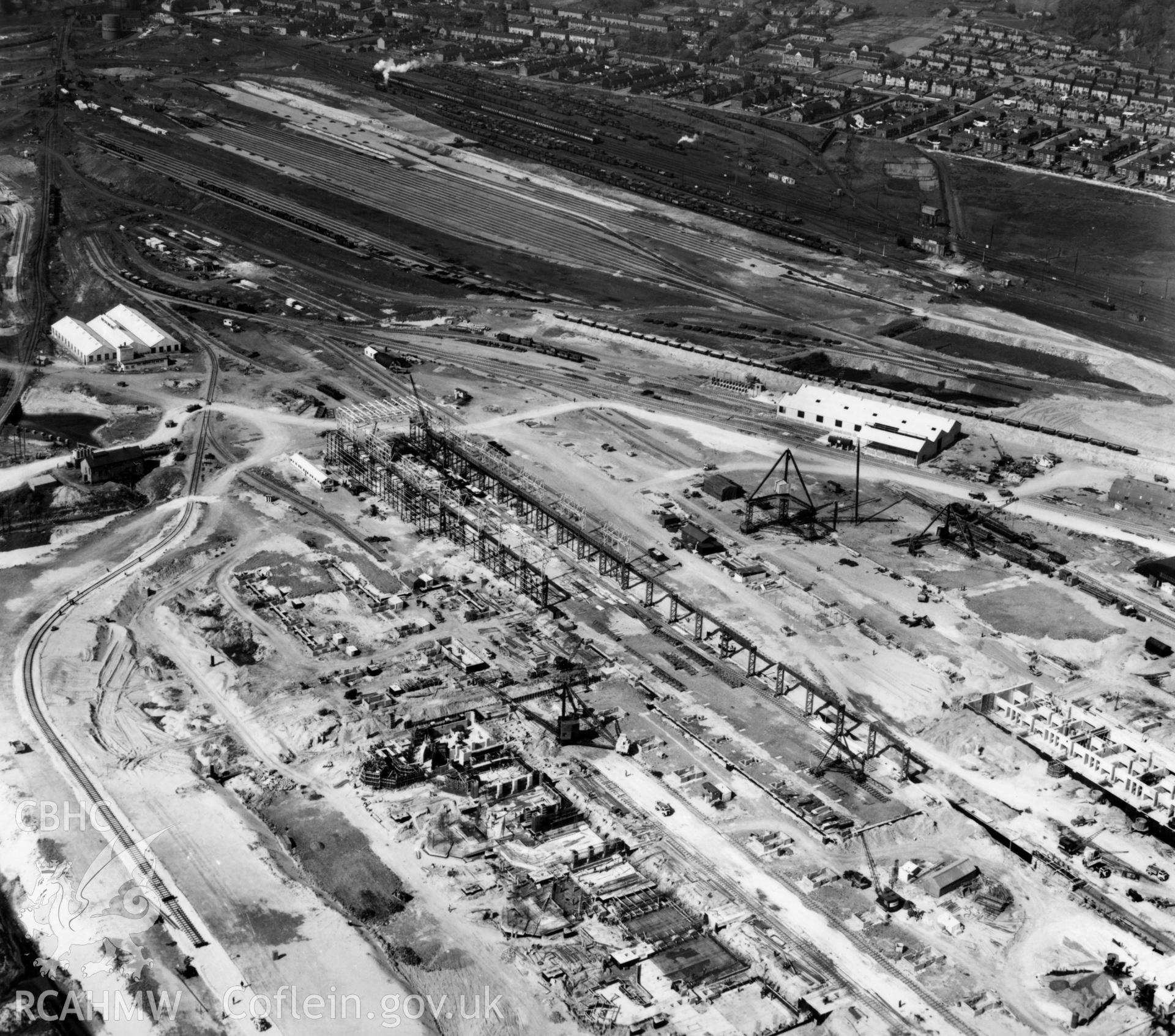 View of Abbey Steelworks, Port Talbot, under construction. Oblique aerial photograph, 5?" cut roll film.
