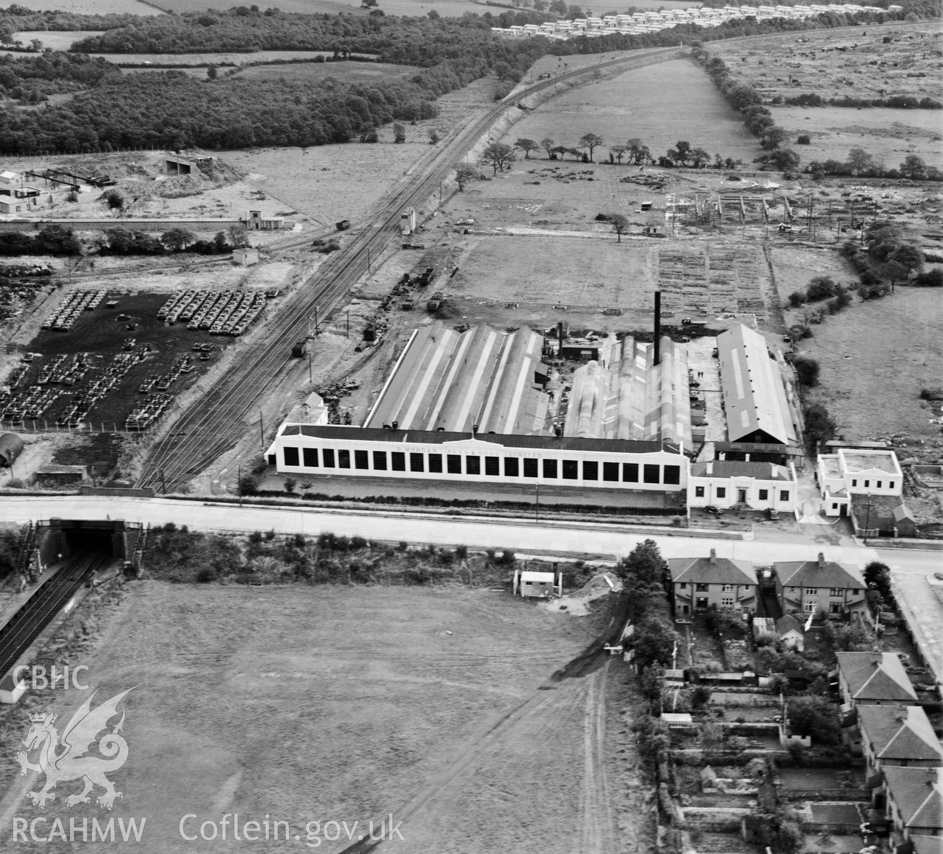 View of Morgan Rees & Sons Ltd. Whitchurch, showing redundant military armoured vehicles stored at the adjacent Royal Odnance Factory