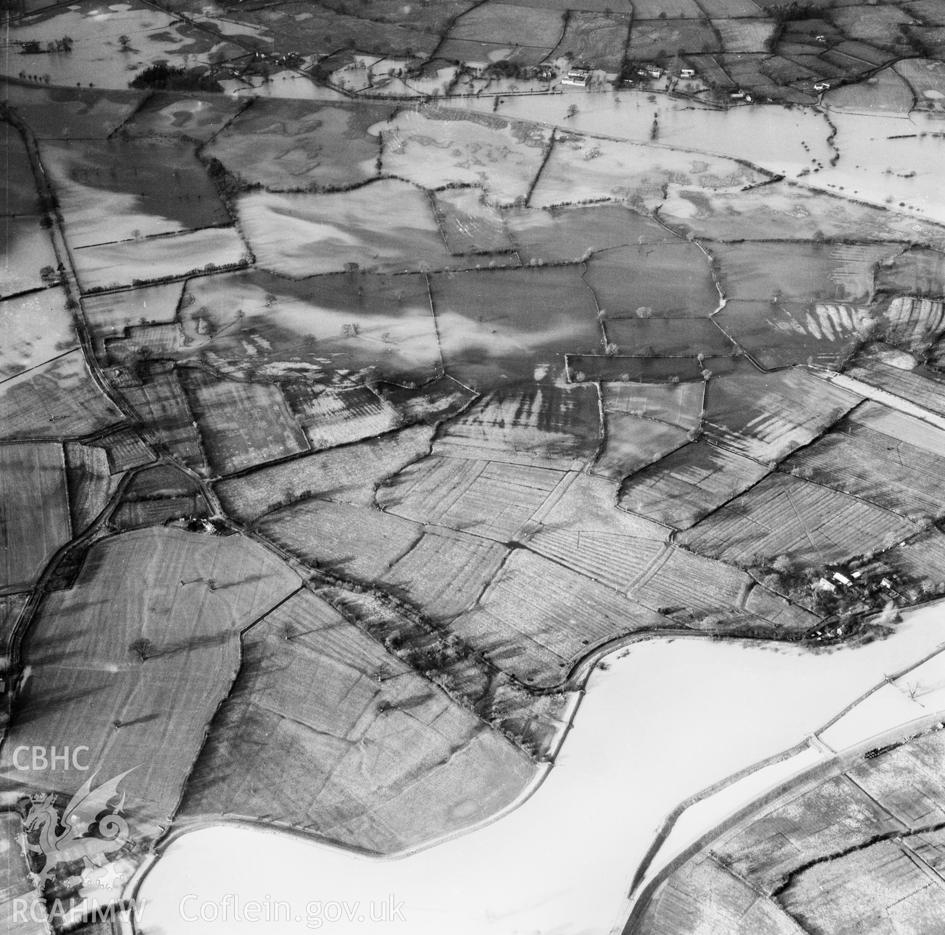 View of the river Severn in flood in the Criggion and Breiddan Hill area. Oblique aerial photograph, 5?" cut roll film.