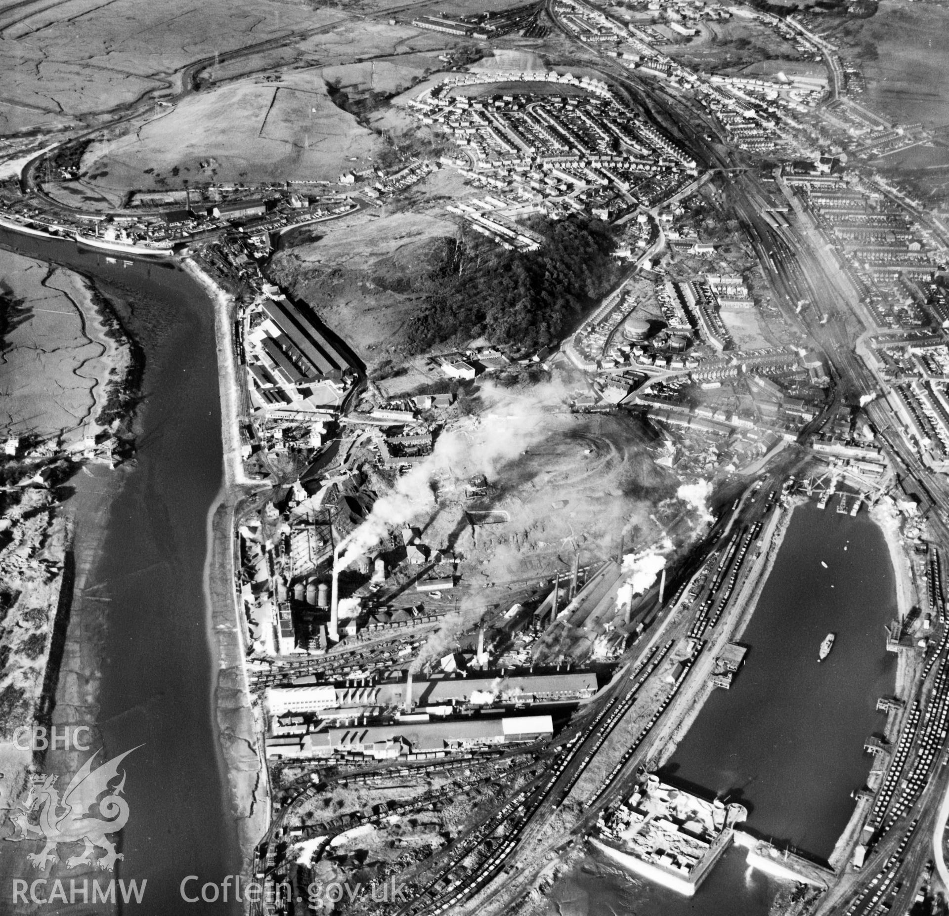 View of Briton Ferry and the Cleveland Bridge under construction. Oblique aerial photograph, 5?" cut roll film.