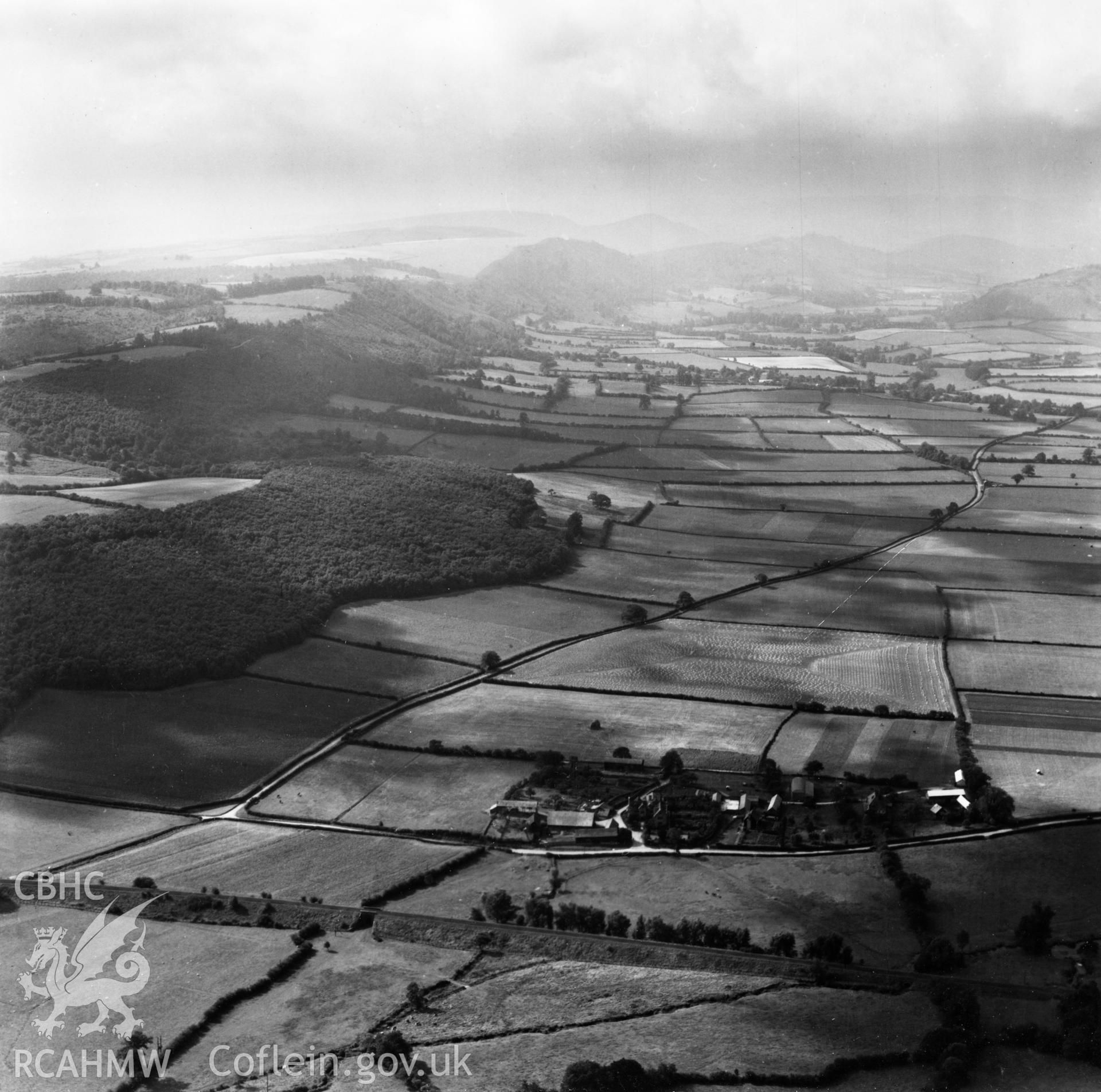 View of Rodd House, Presteigne in surrounding landscape. Oblique aerial photograph, 5?" cut roll film.