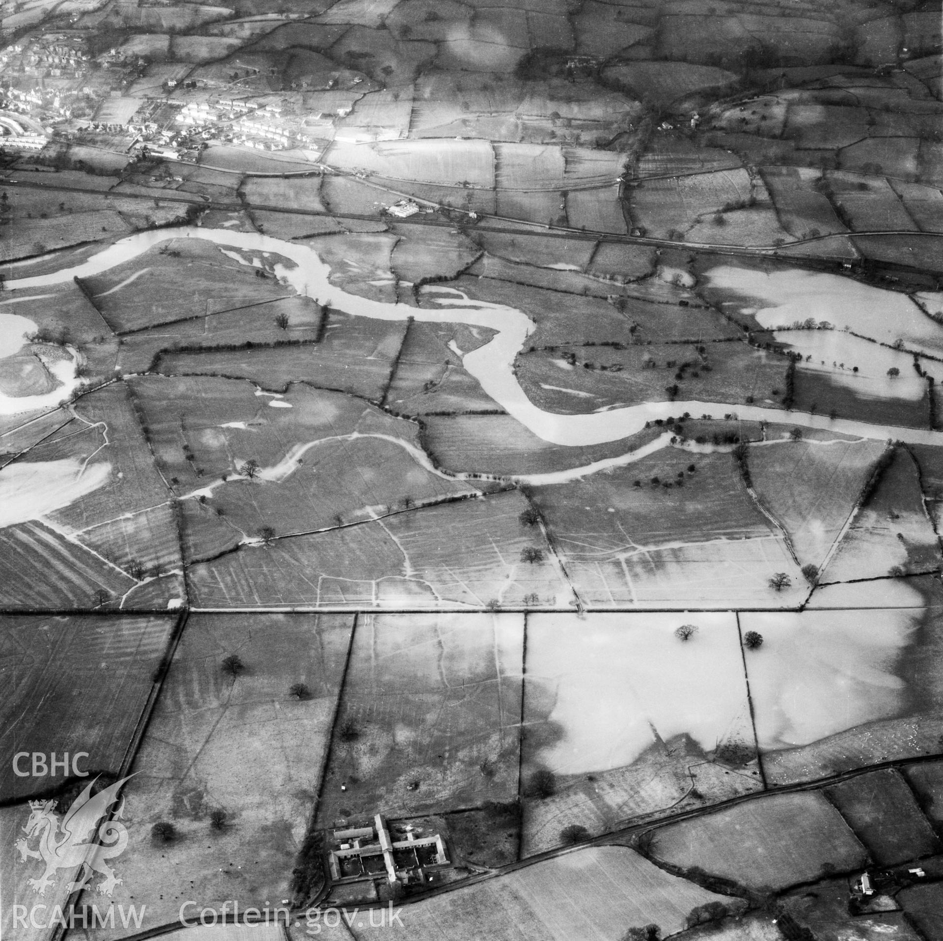 View of the river Severn in flood in the Criggion and Breiddan Hill area. Oblique aerial photograph, 5?" cut roll film.