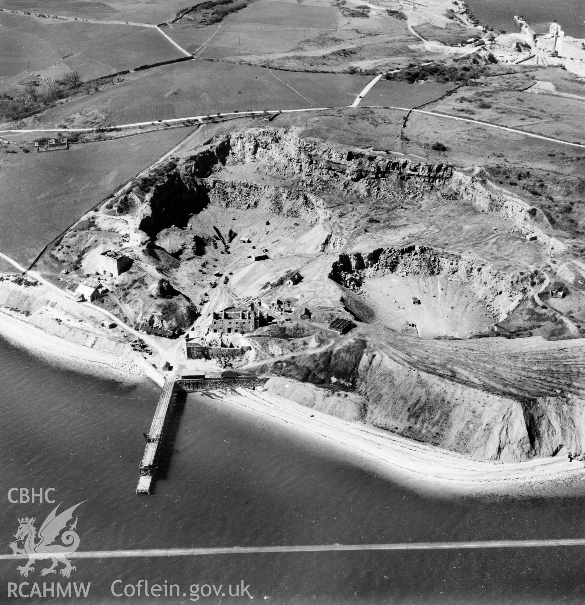 View of Flagstaff Quarry, Anglesey, commissioned by Cawood Wharton & Co. Ltd.. Oblique aerial photograph, 5?" cut roll film.