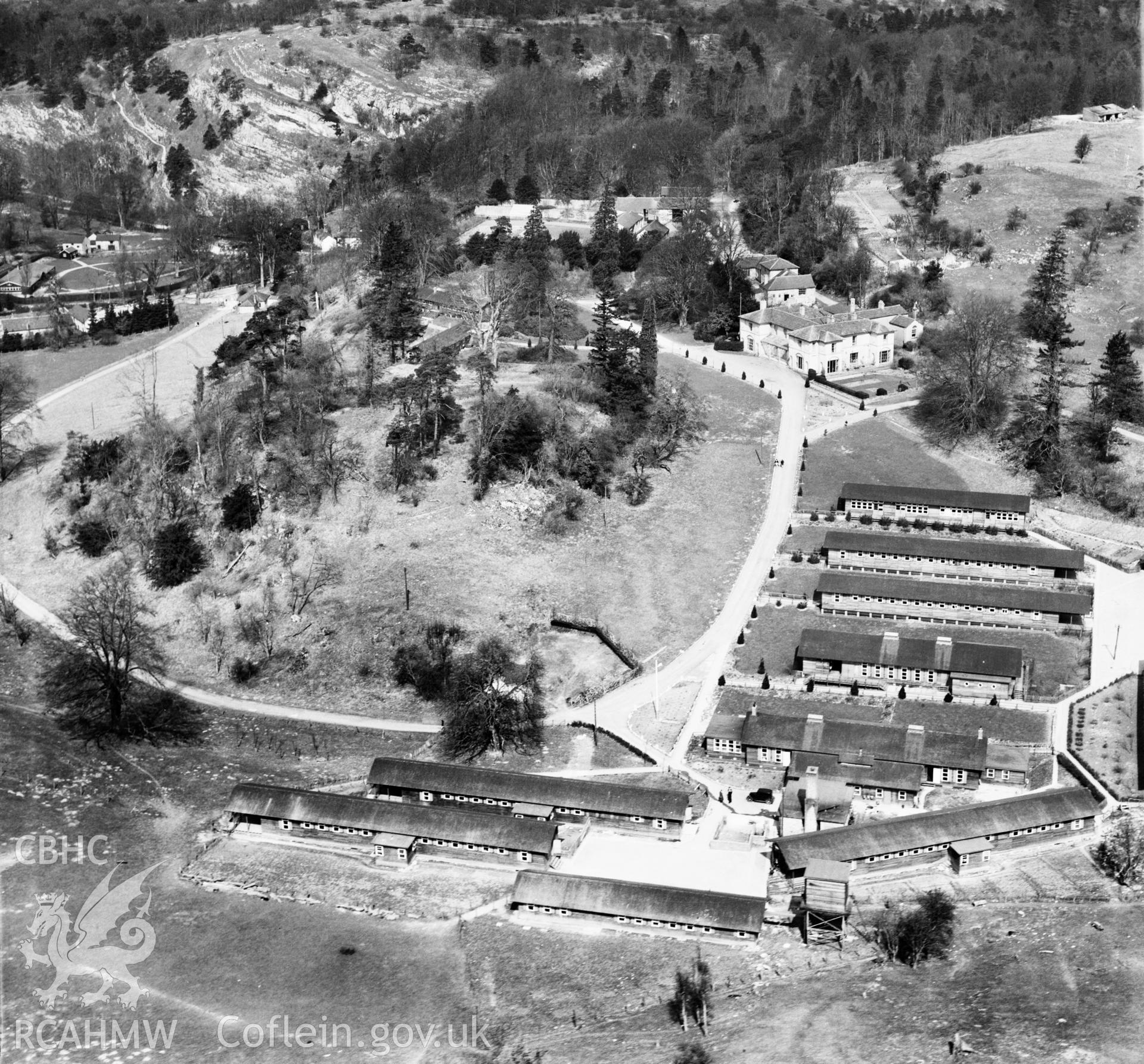 View of Colomendy Camp commissioned by J. Gerrard & Sons Ltd. Swinton, titled: 'Manchester Holiday Camp'. Oblique aerial photograph, 5?" cut roll film.