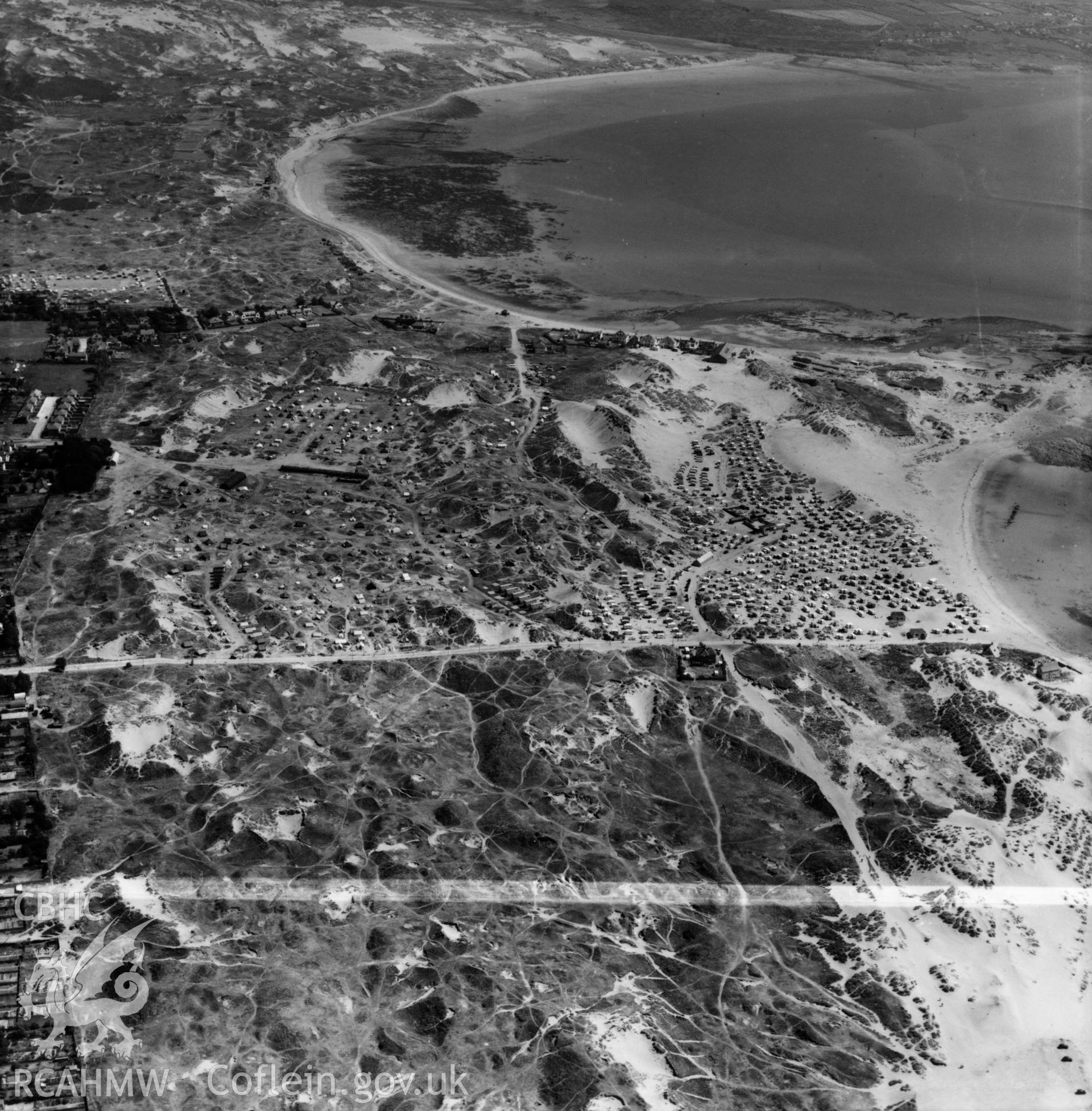 View of Newton Burrows, Porthcawl showing caravans. Oblique aerial photograph, 5?" cut roll film.