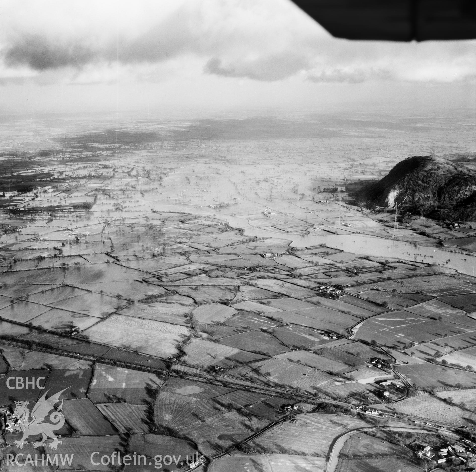 View of the river Severn in flood in the Criggion and Breiddan Hill area. Oblique aerial photograph, 5?" cut roll film.