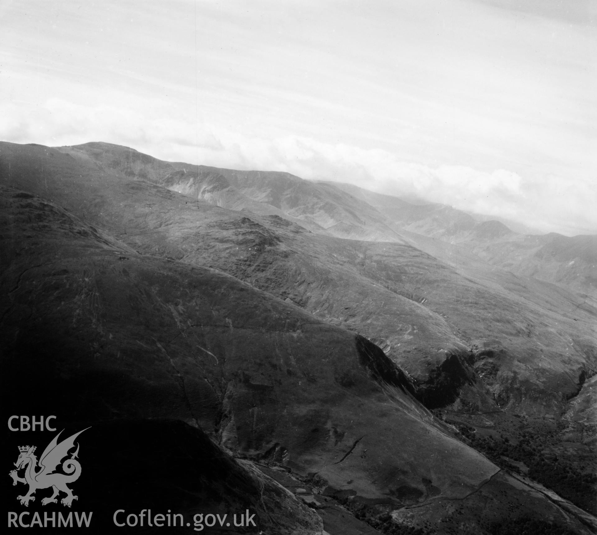 View of mountains in Snowdonia to the south of Penmaenmawr. Oblique aerial photograph, 5?" cut roll film.