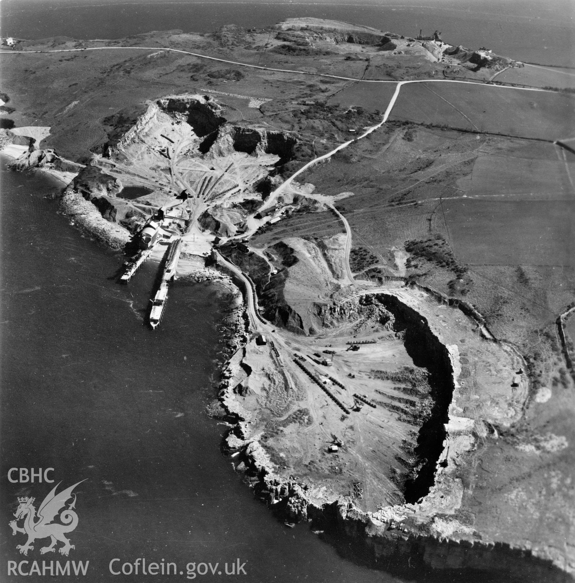 View of Dinmor Park Quarry, Anglesey, commissioned by Cawood Wharton & Co. Ltd.. Oblique aerial photograph, 5?" cut roll film.
