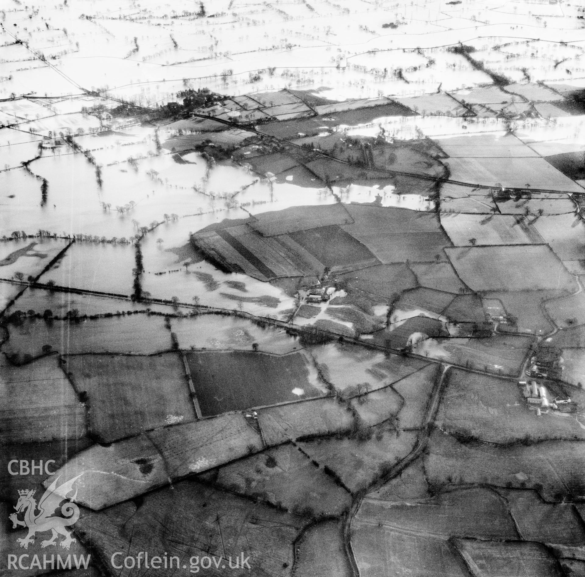 View of the river Severn in flood in the Criggion and Breiddan Hill area. Oblique aerial photograph, 5?" cut roll film.