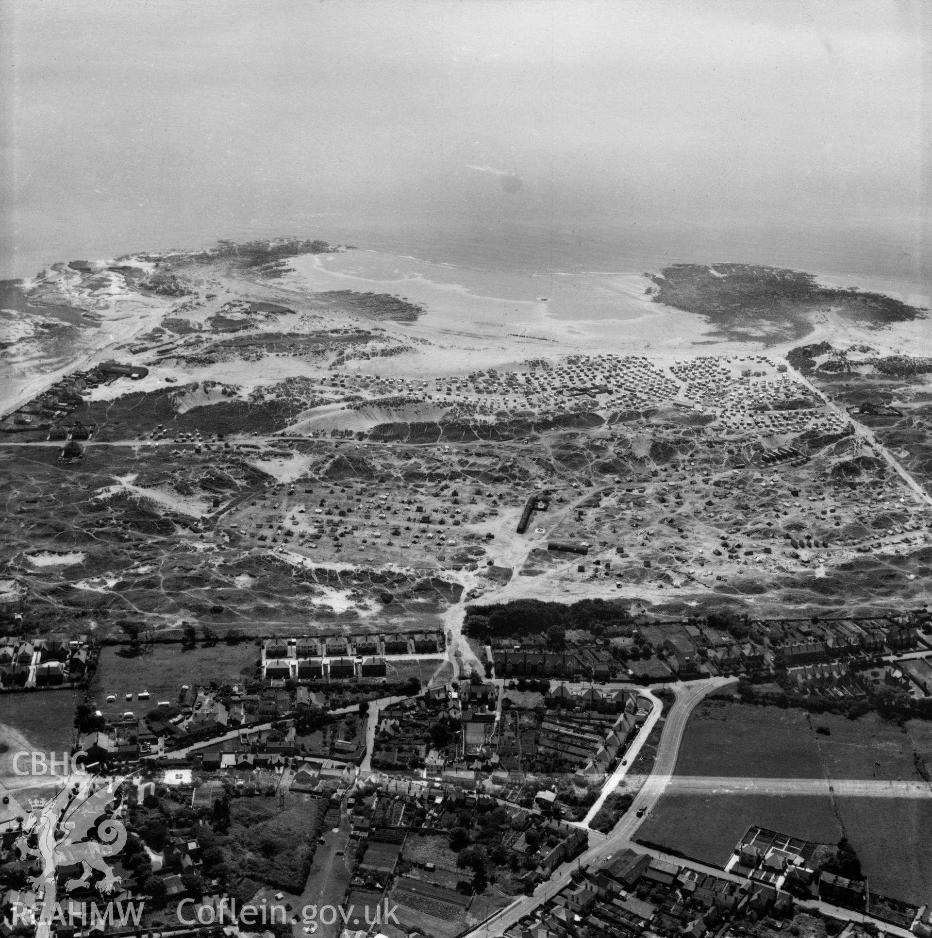View of Newton Burrows, Porthcawl showing caravans. Oblique aerial photograph, 5?" cut roll film.