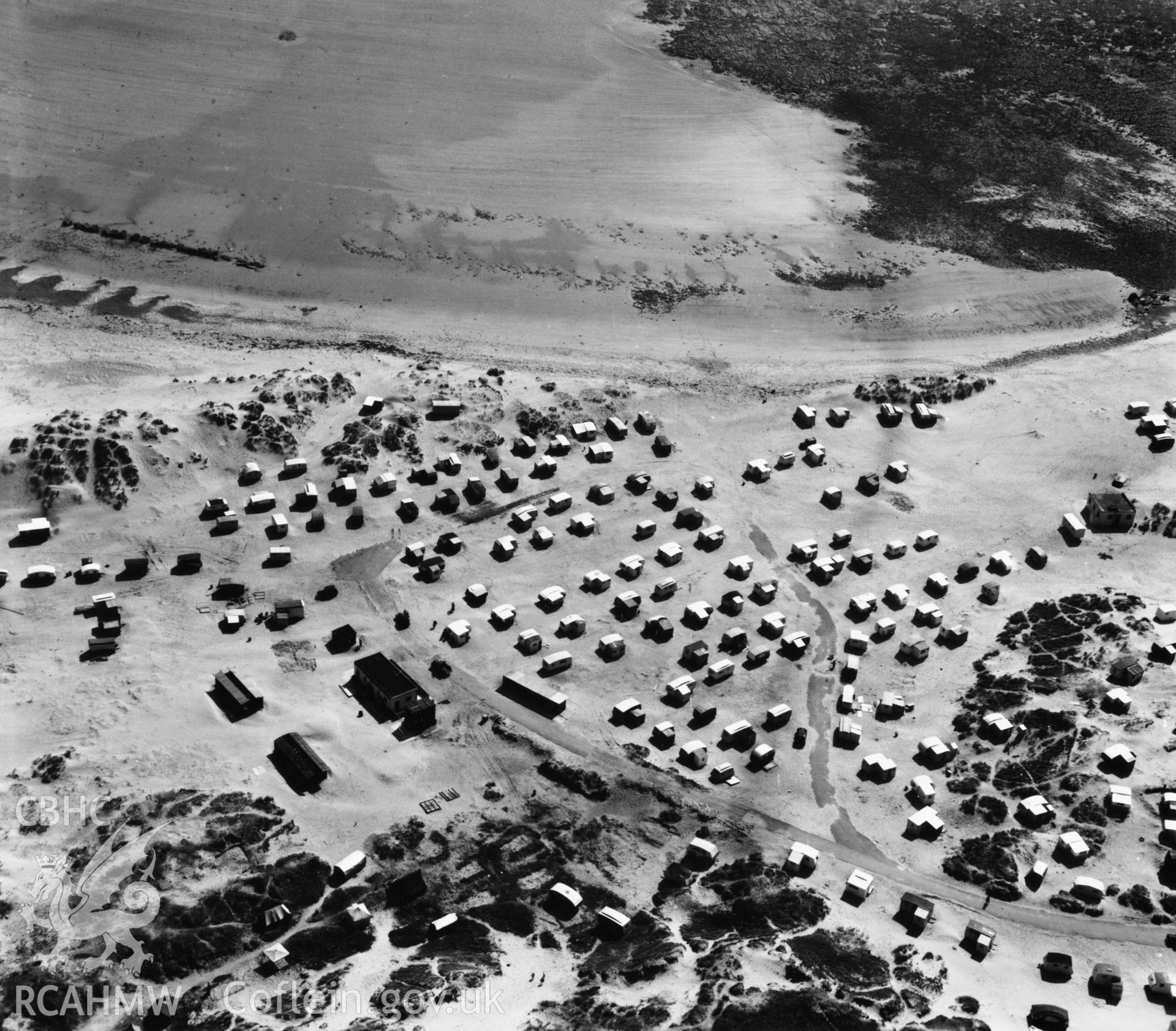 View of caravans on the beach at Porthcawl. Oblique aerial photograph, 5?" cut roll film.