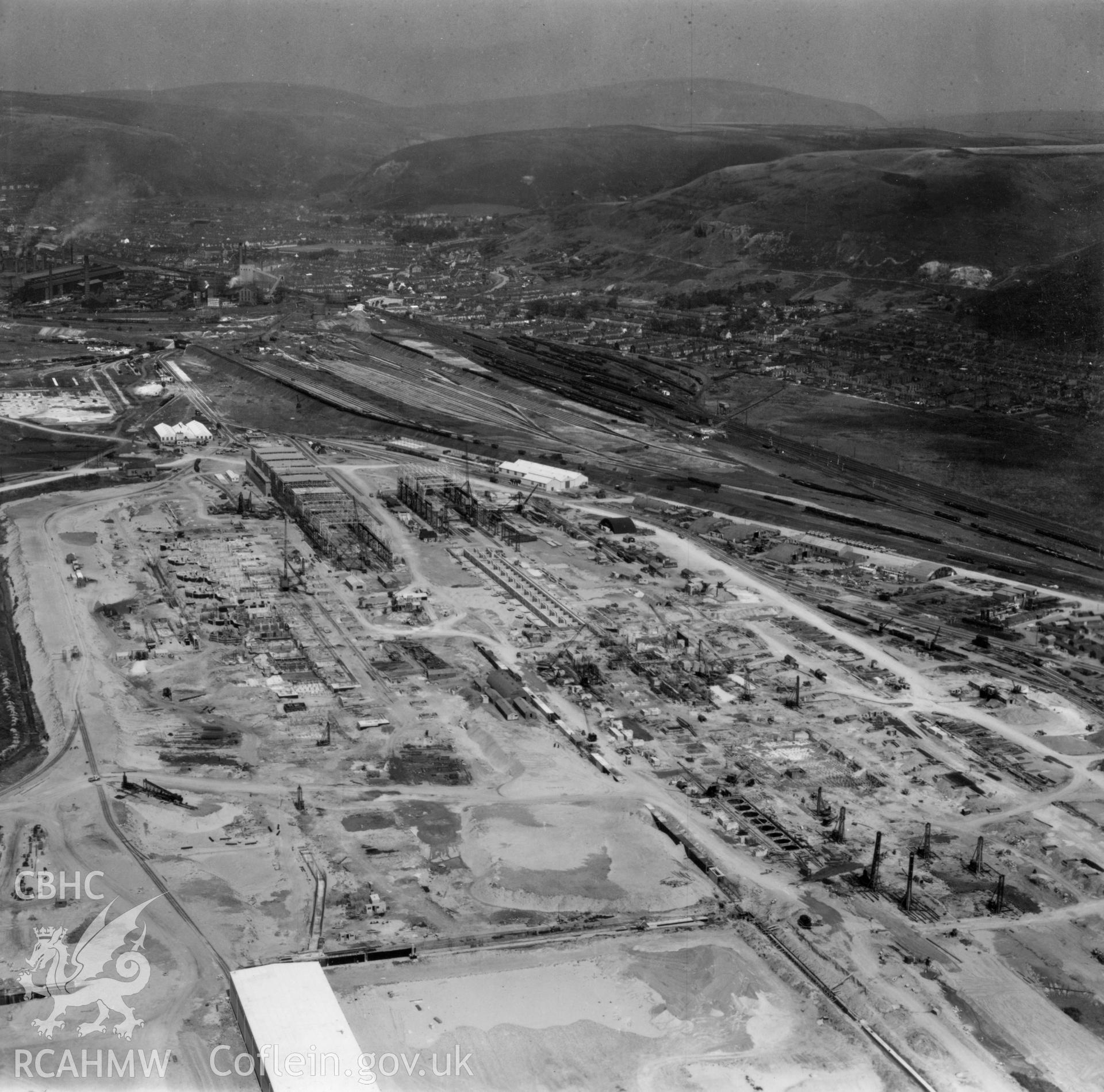 General view of Margam Steelworks, Port Talbot, under construction. Oblique aerial photograph, 5?" cut roll film.