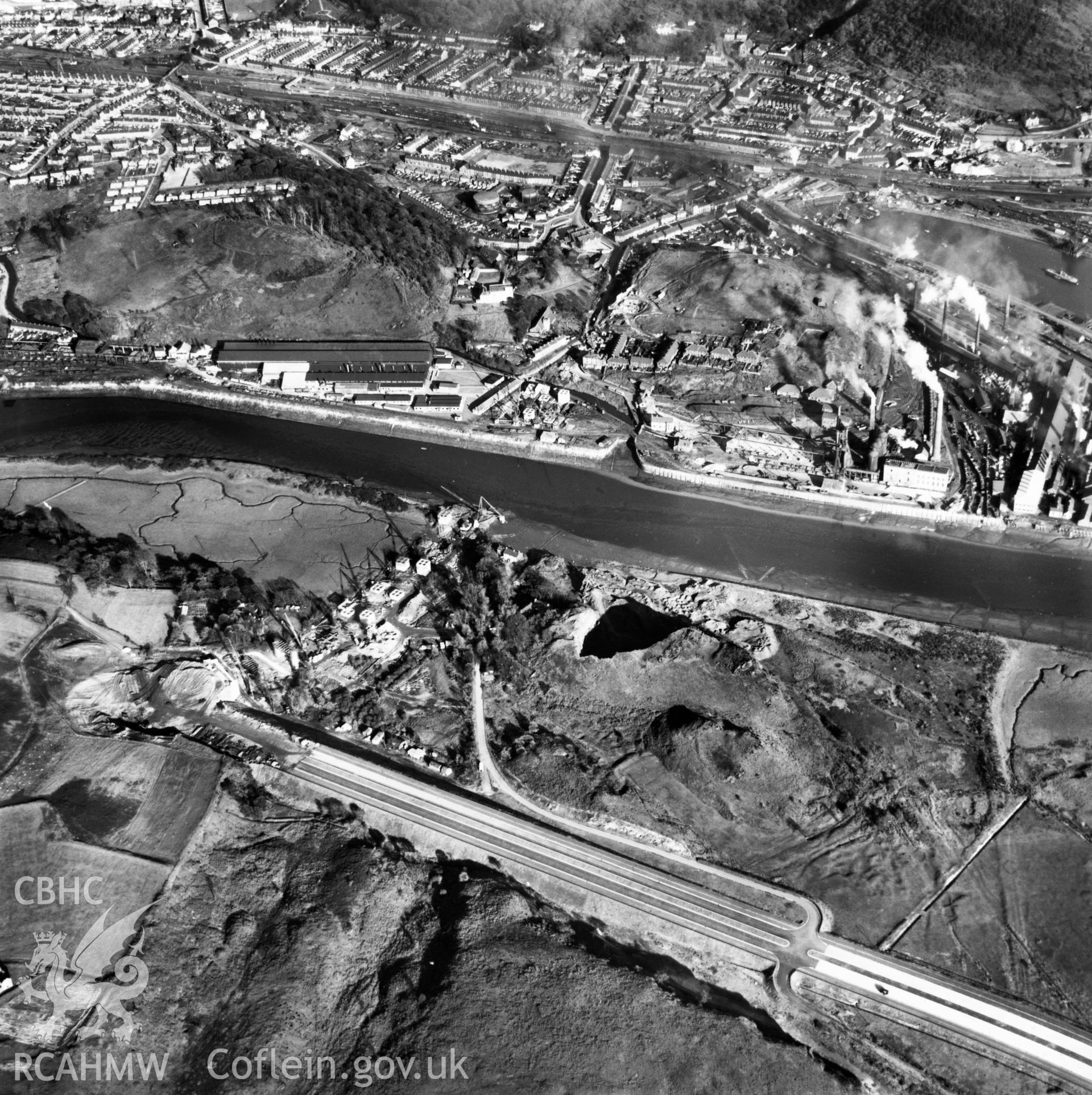 View of the Cleveland Bridge & Engineering Co. Ltd. Bridge under construction at Briton Ferry. Oblique aerial photograph, 5?" cut roll film.