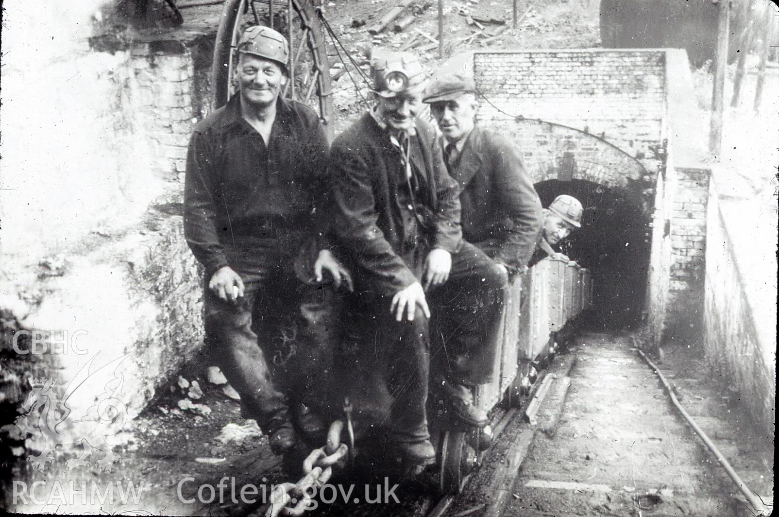 Digital photograph showing Stan Williams, Fred Roberts and others on wagons at Great Mountain colliery, Tumble, taken 1953.