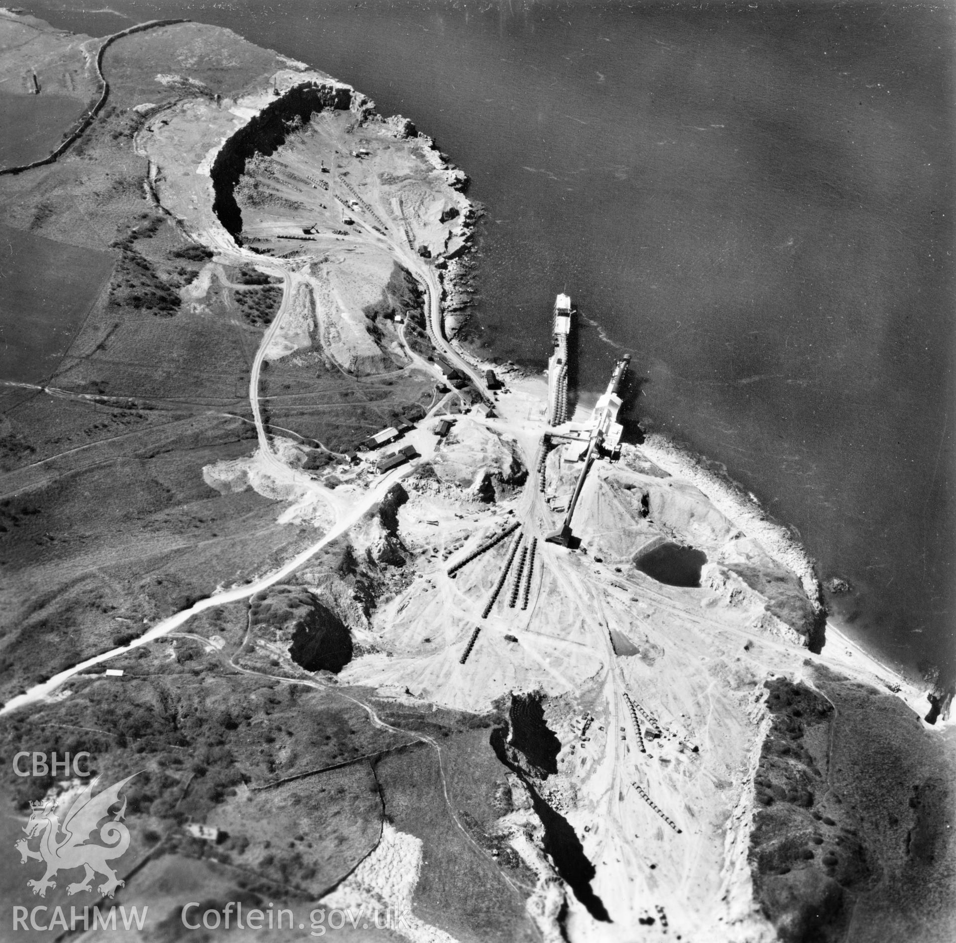 View of Dinmor Park Quarry, Anglesey, commissioned by Cawood Wharton & Co. Ltd.. Oblique aerial photograph, 5?" cut roll film.