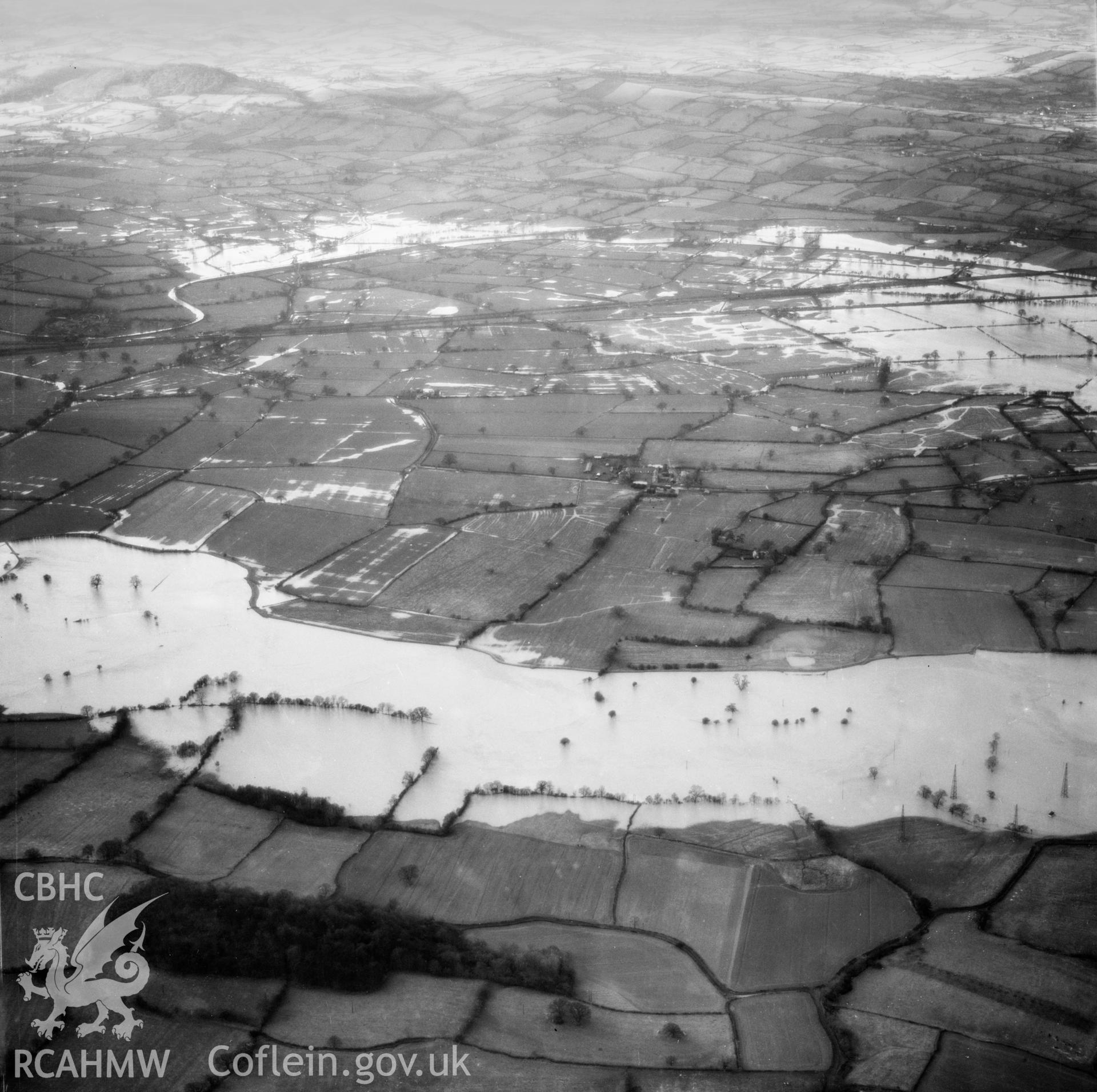 View of the river Severn in flood in the Criggion and Breiddan Hill area. Oblique aerial photograph, 5?" cut roll film.