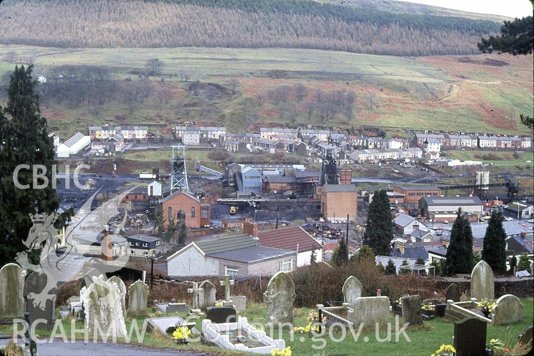 Digital photograph showing Merthyr Vale colliery, with Aberfan cemetary in the foreground, taken 1985